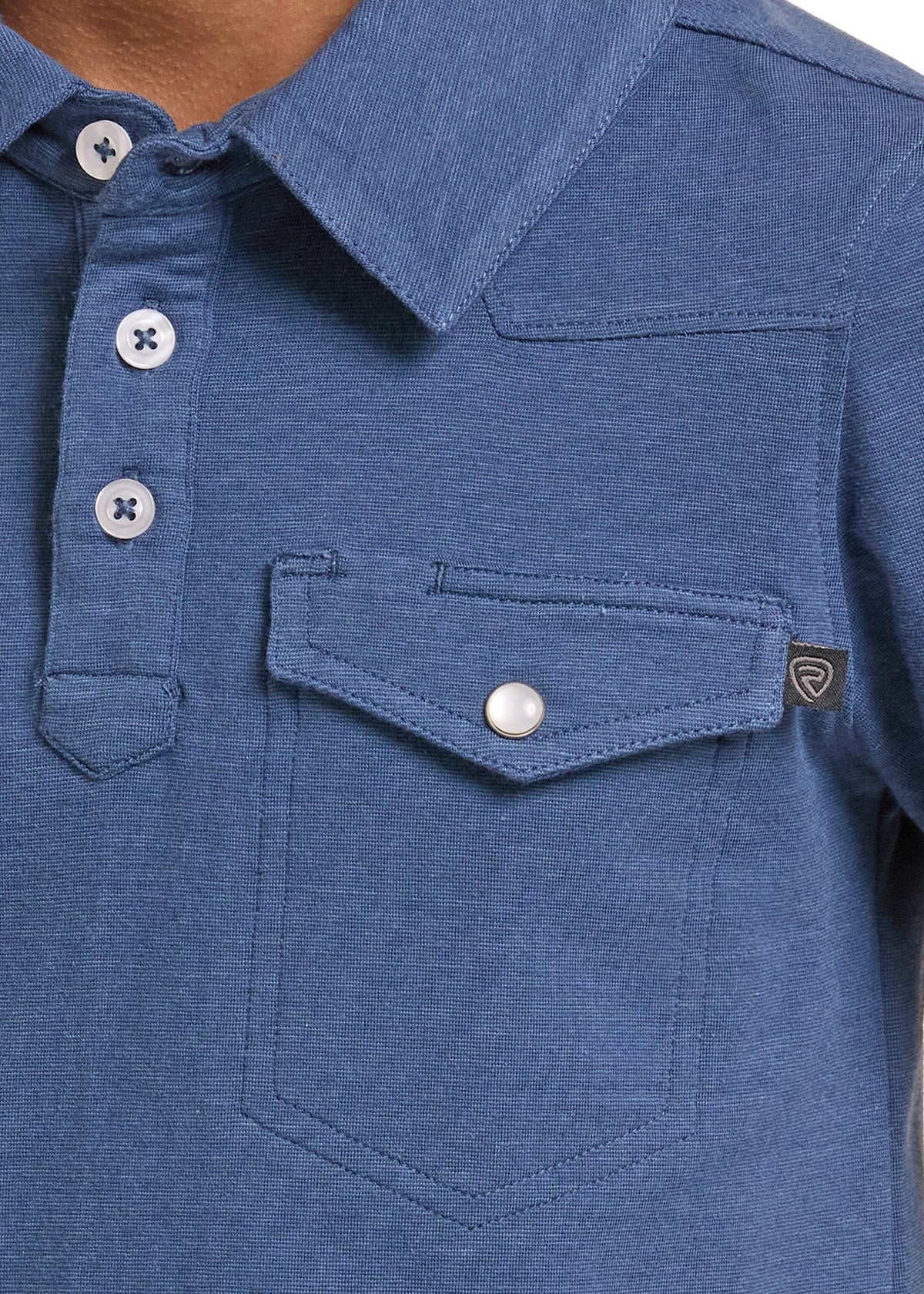 Close-up of a boy wearing a heathered blue short-sleeve polo shirt with a three-button placket and a chest pocket.