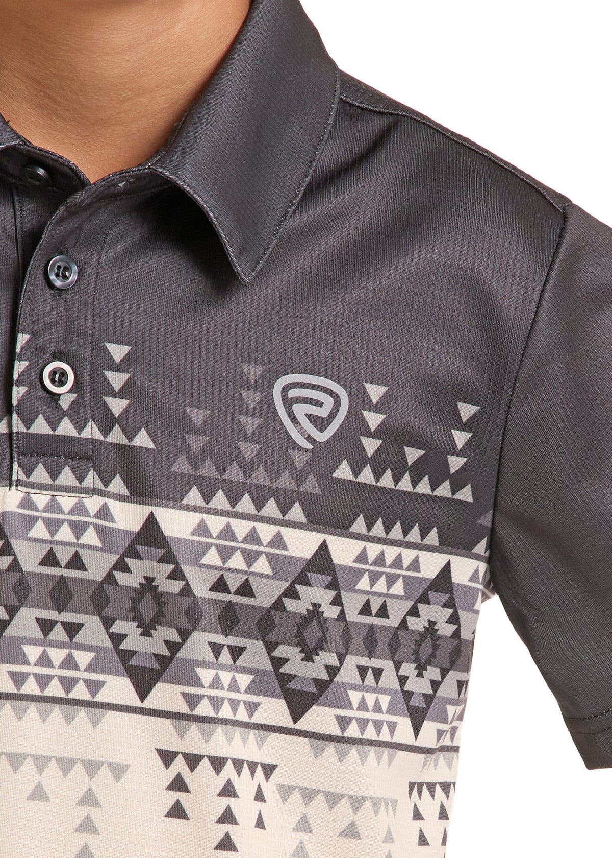 Close-up of a short-sleeve polo shirt with a dark gray and white geometric pattern, featuring a collar and a stylized shield logo on the chest.