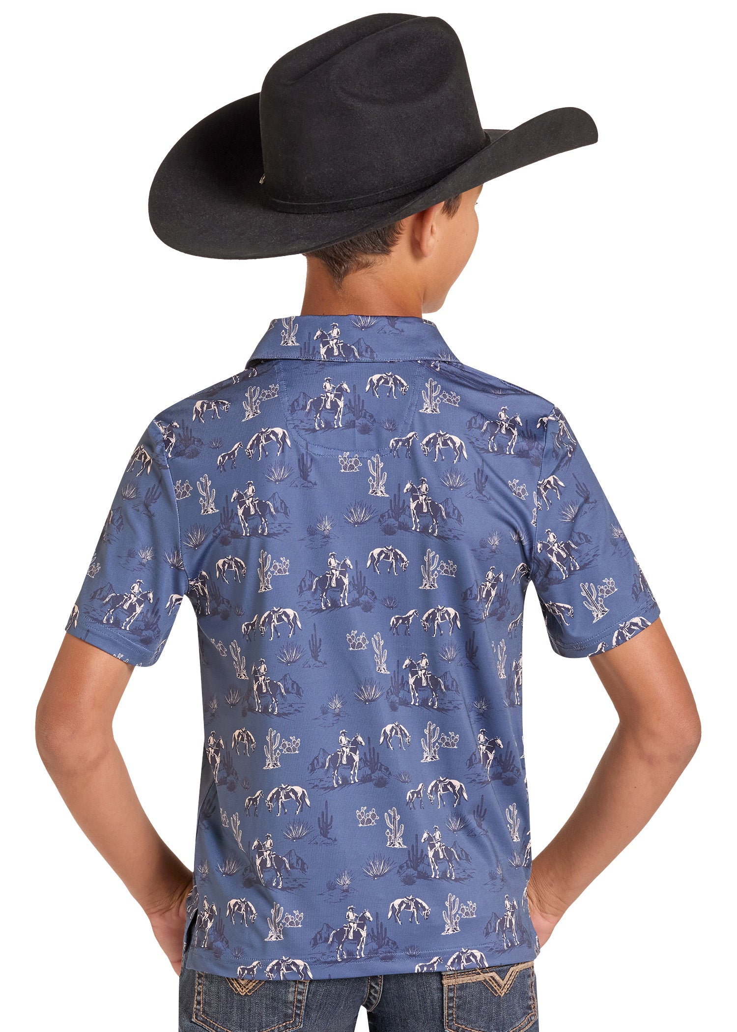A child wearing a blue short-sleeve button-up shirt with a cowboy-themed print, shown from the back. The shirt features a repeating pattern of cowboys on horseback under umbrellas.