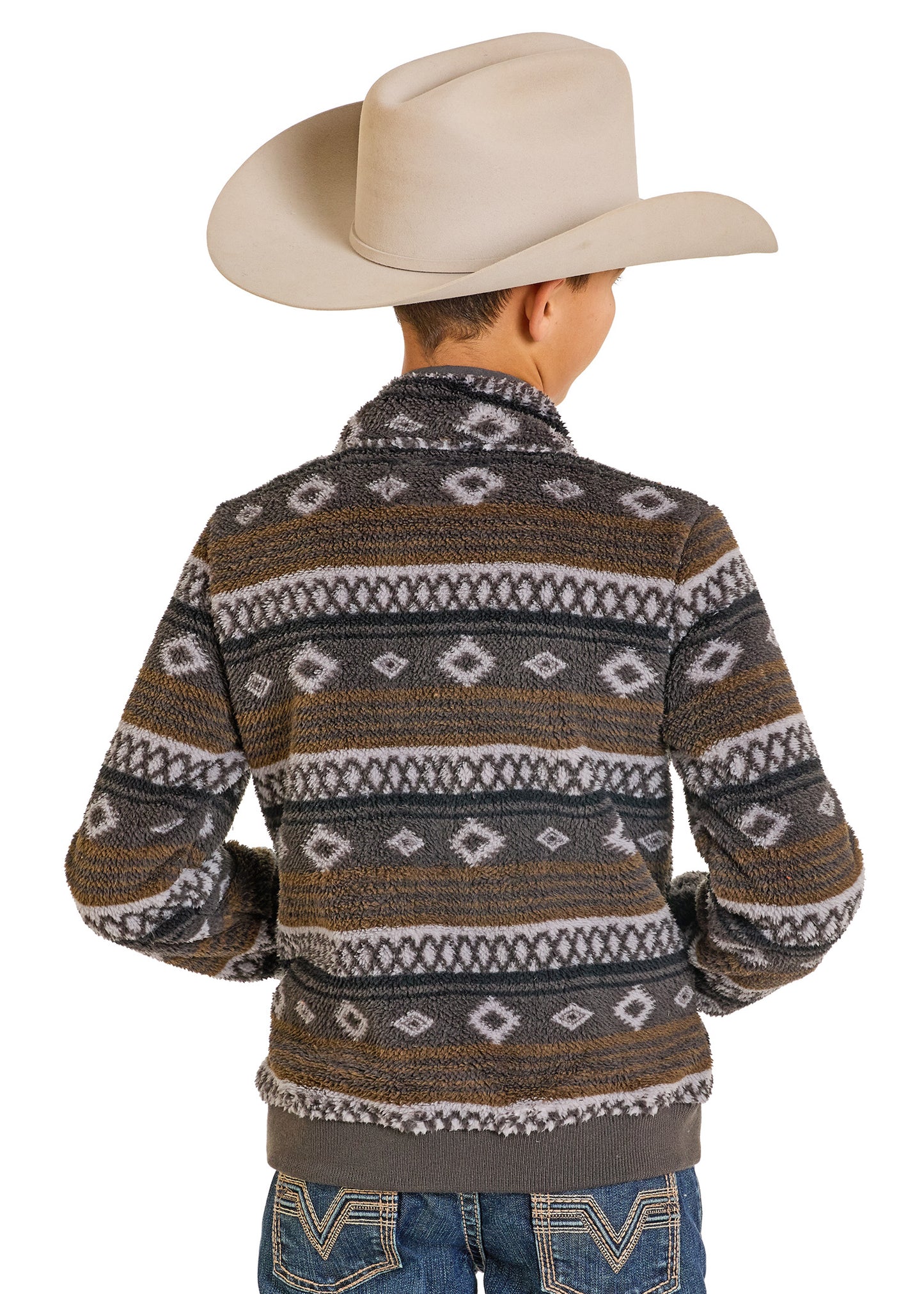 Person wearing a patterned sweater and cowboy hat on a white background