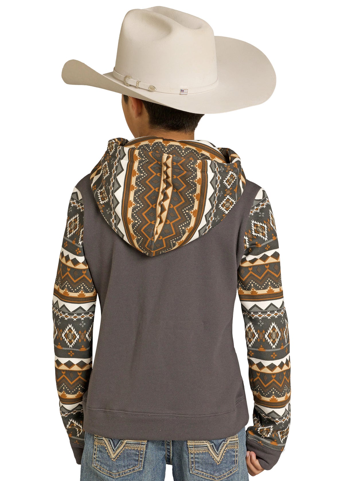 Person wearing a patterned hoodie with a hood, jeans, and a cowboy hat on a white background