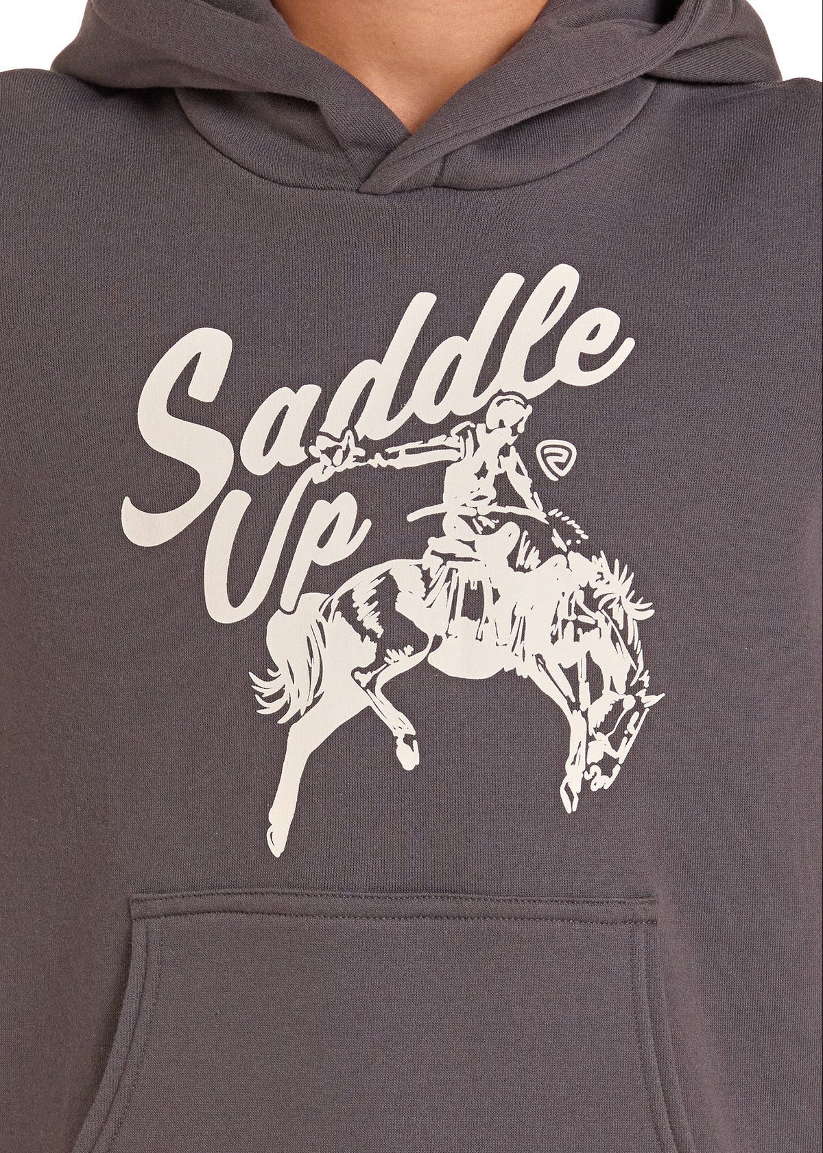 A close-up of a person wearing a dark gray hooded sweatshirt with a white graphic print that reads 'Saddle Up' above an illustration of a rider on a bucking horse.