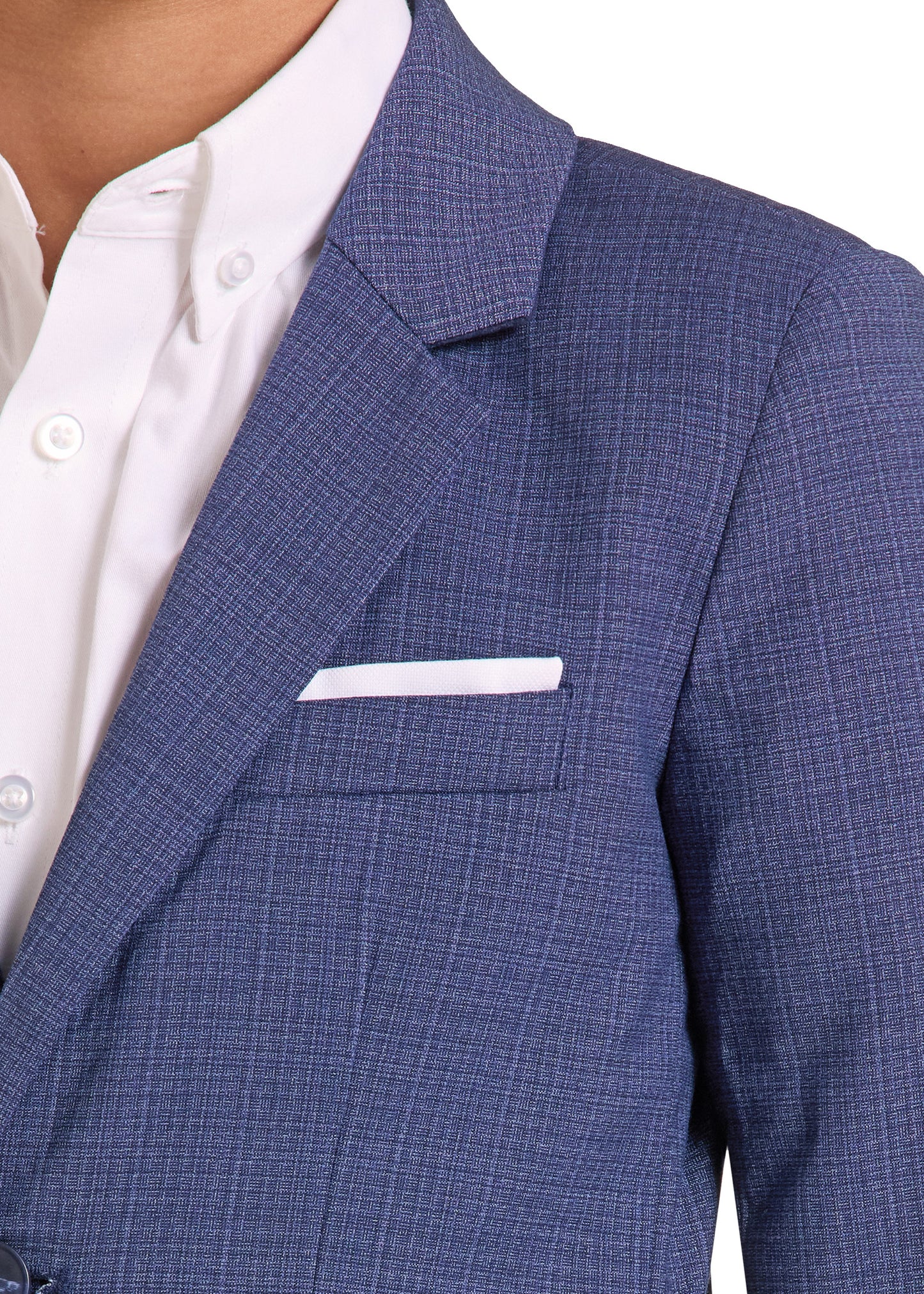 A close-up of a man wearing a blue textured blazer with a white pocket square and a white button-down shirt.