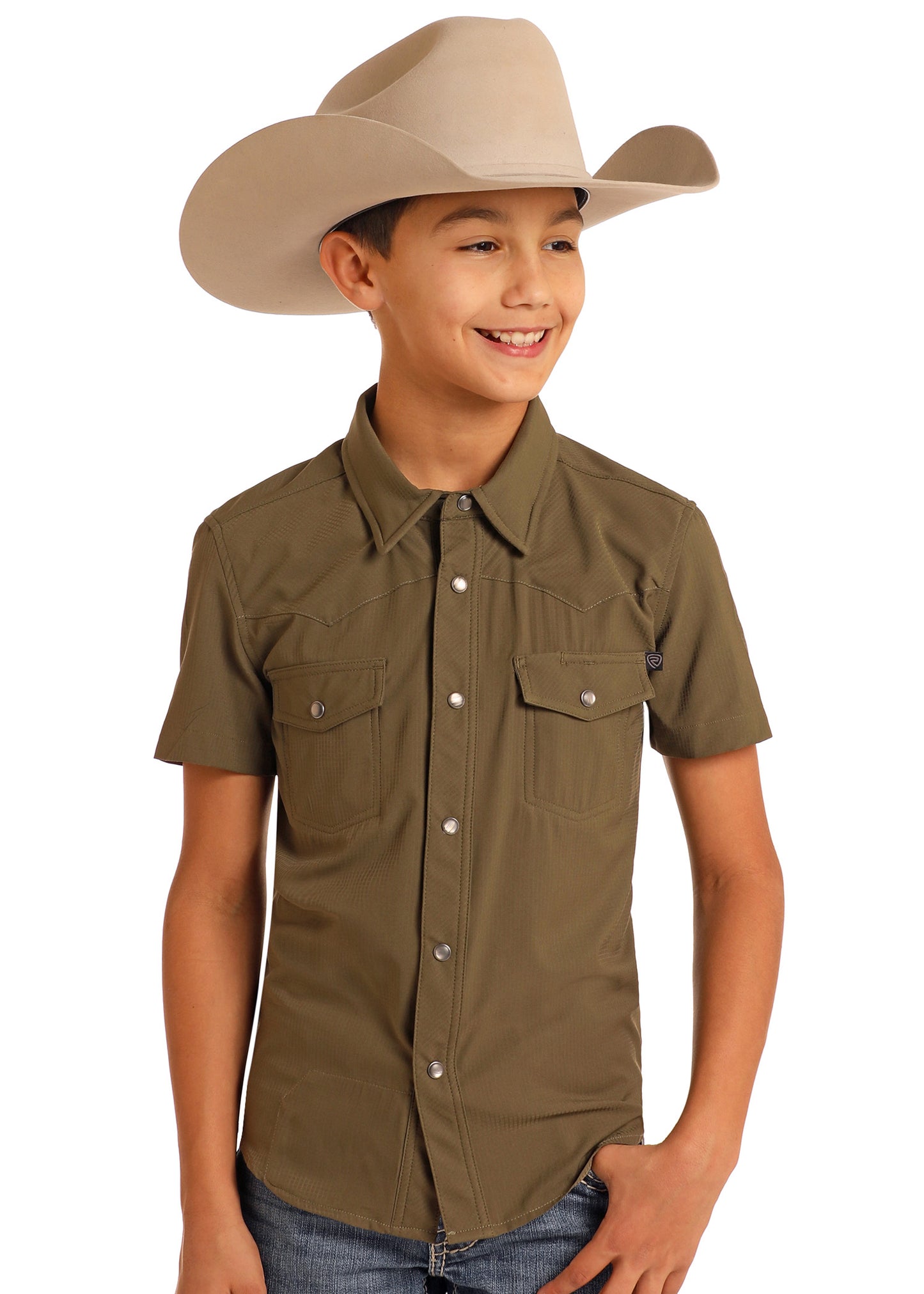 Child wearing a brown cowboy hat and shirt on a white background