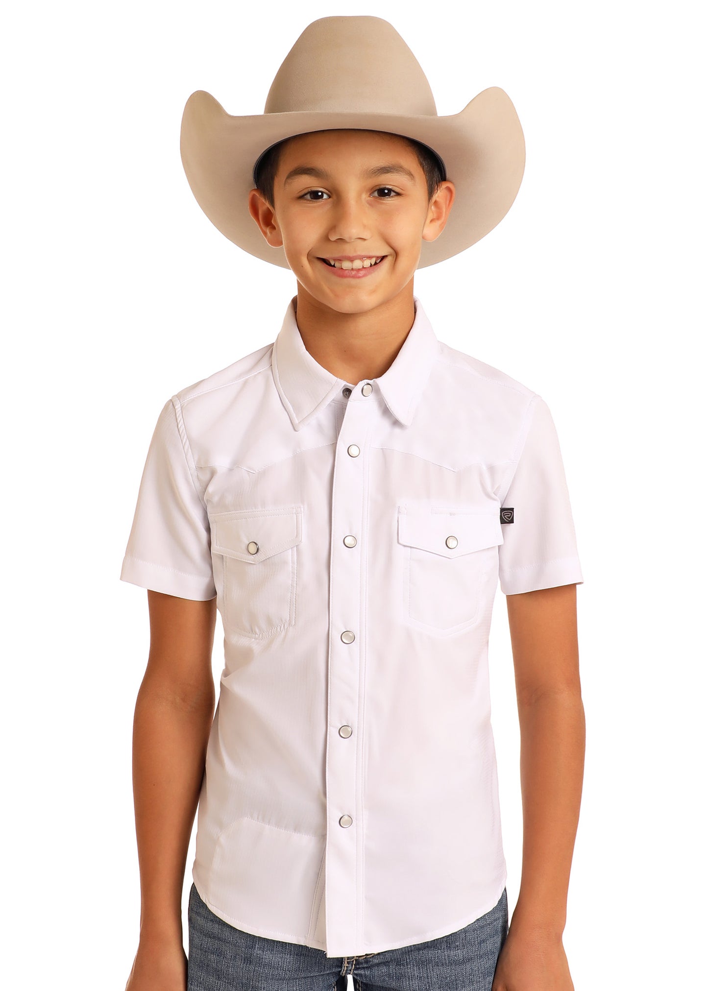 Child wearing a white shirt and beige cowboy hat on a white background