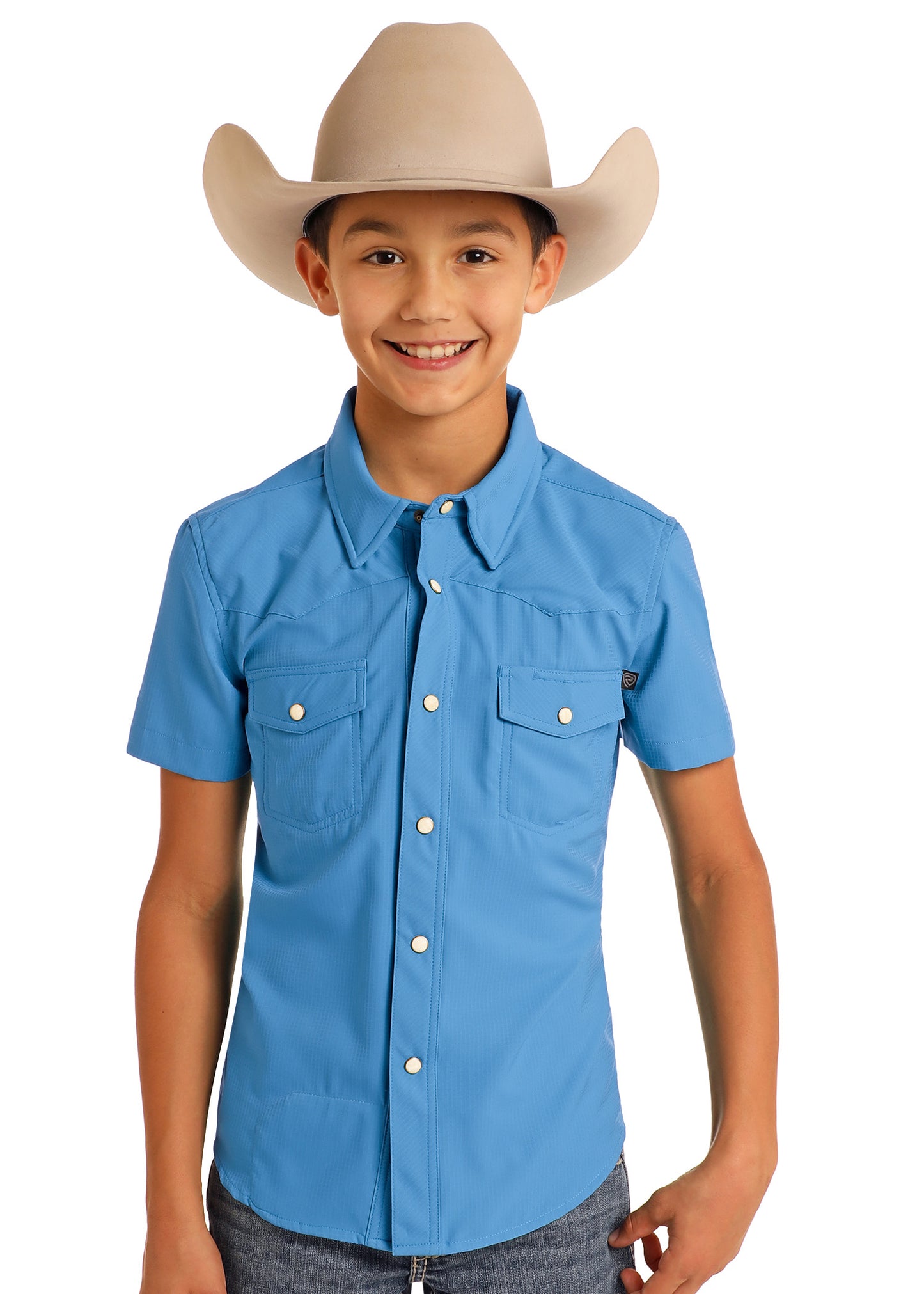 Child wearing a blue shirt and beige cowboy hat on a white background