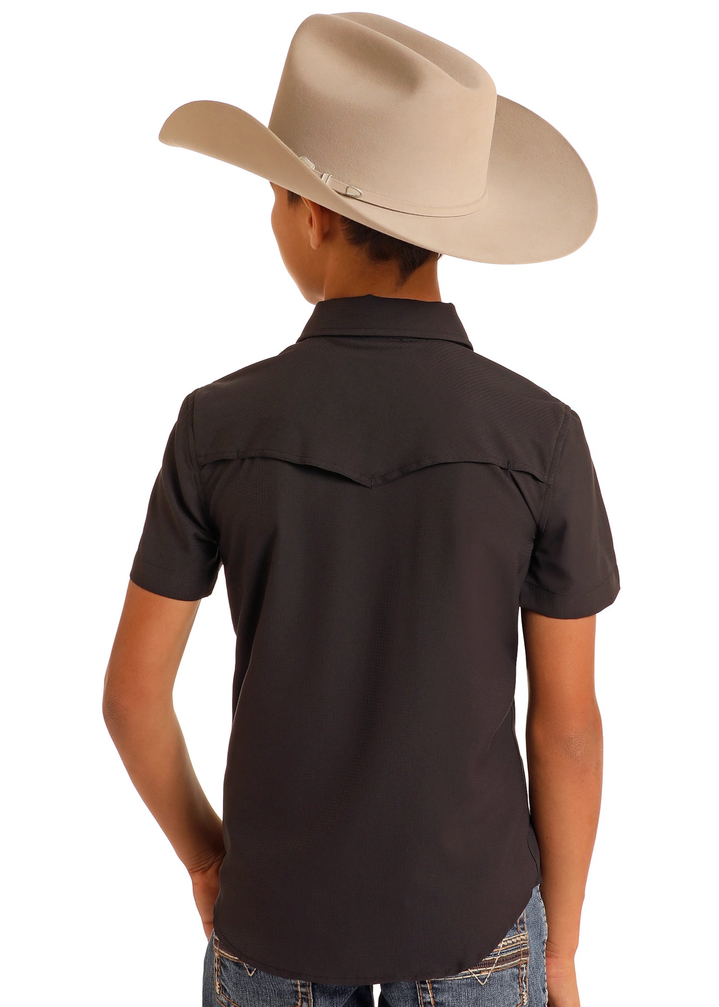 Person wearing a brown cowboy hat and dark shirt on a white background