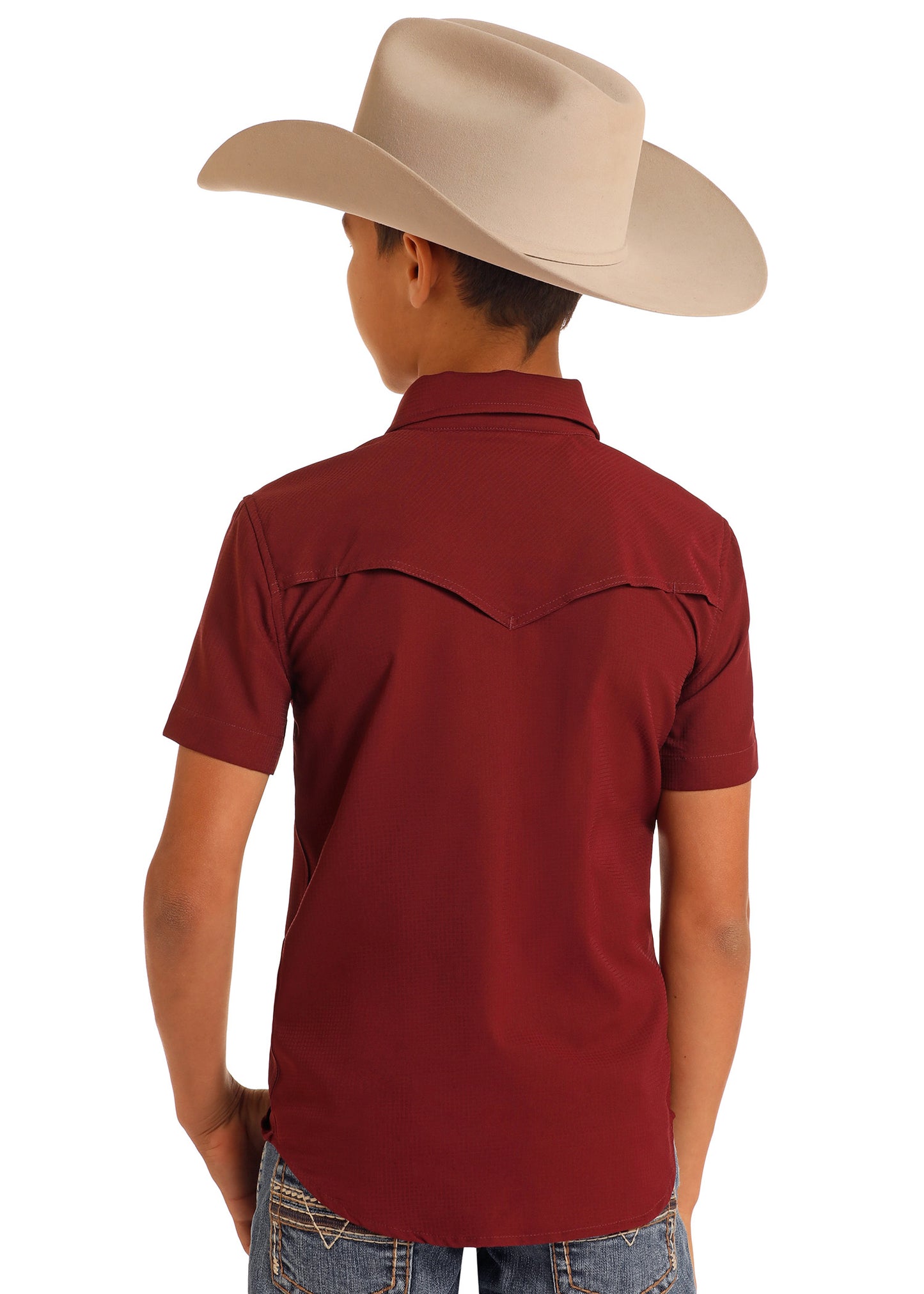 Person wearing a red shirt and beige cowboy hat on a white background