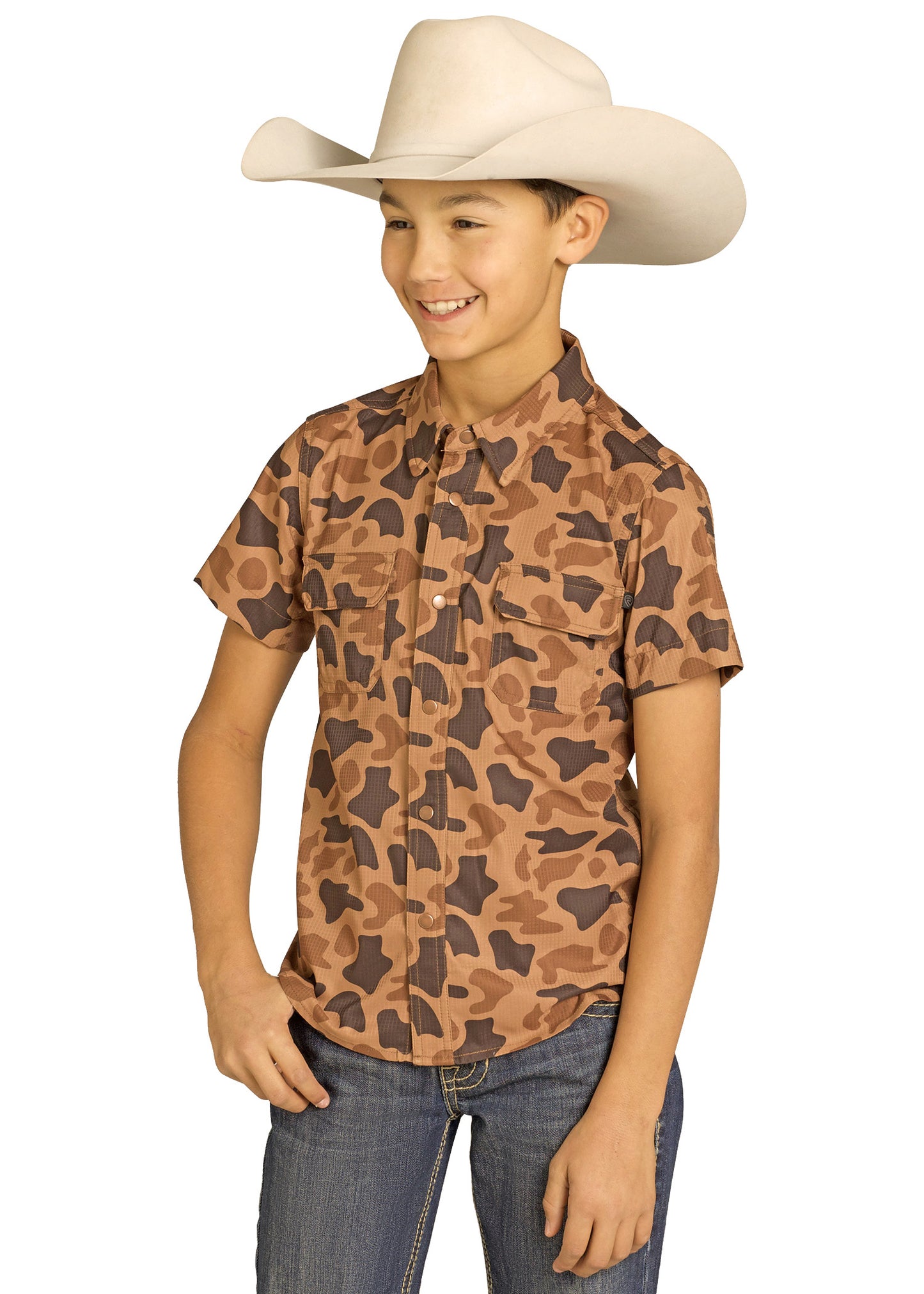 Child wearing a cowboy hat and patterned shirt on a white background