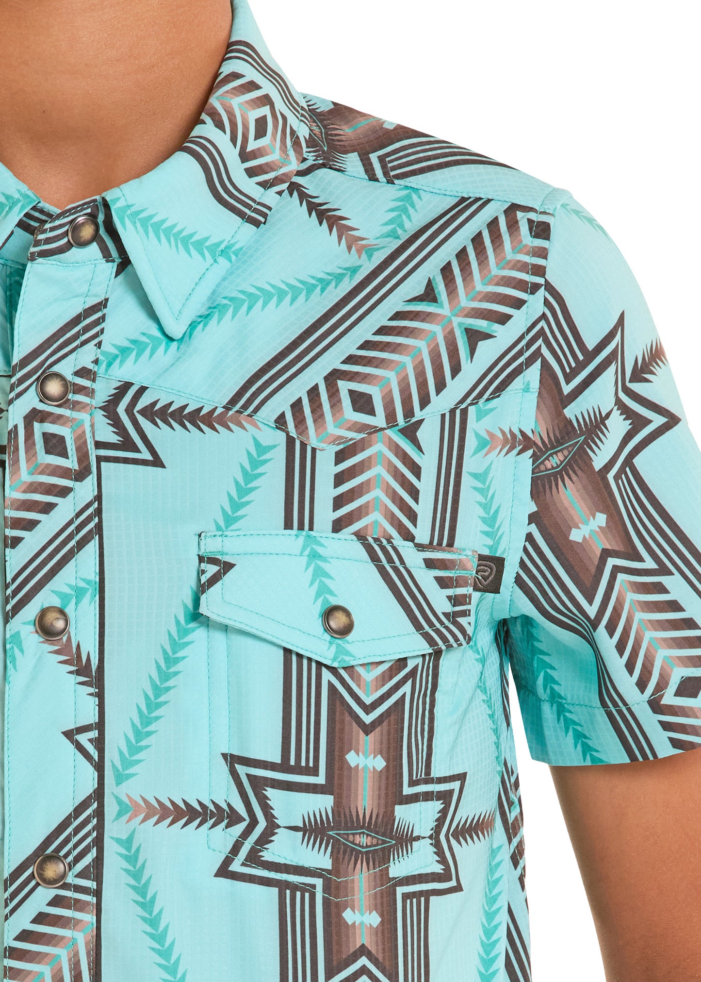 Close-up of a turquoise shirt with brown geometric pattern