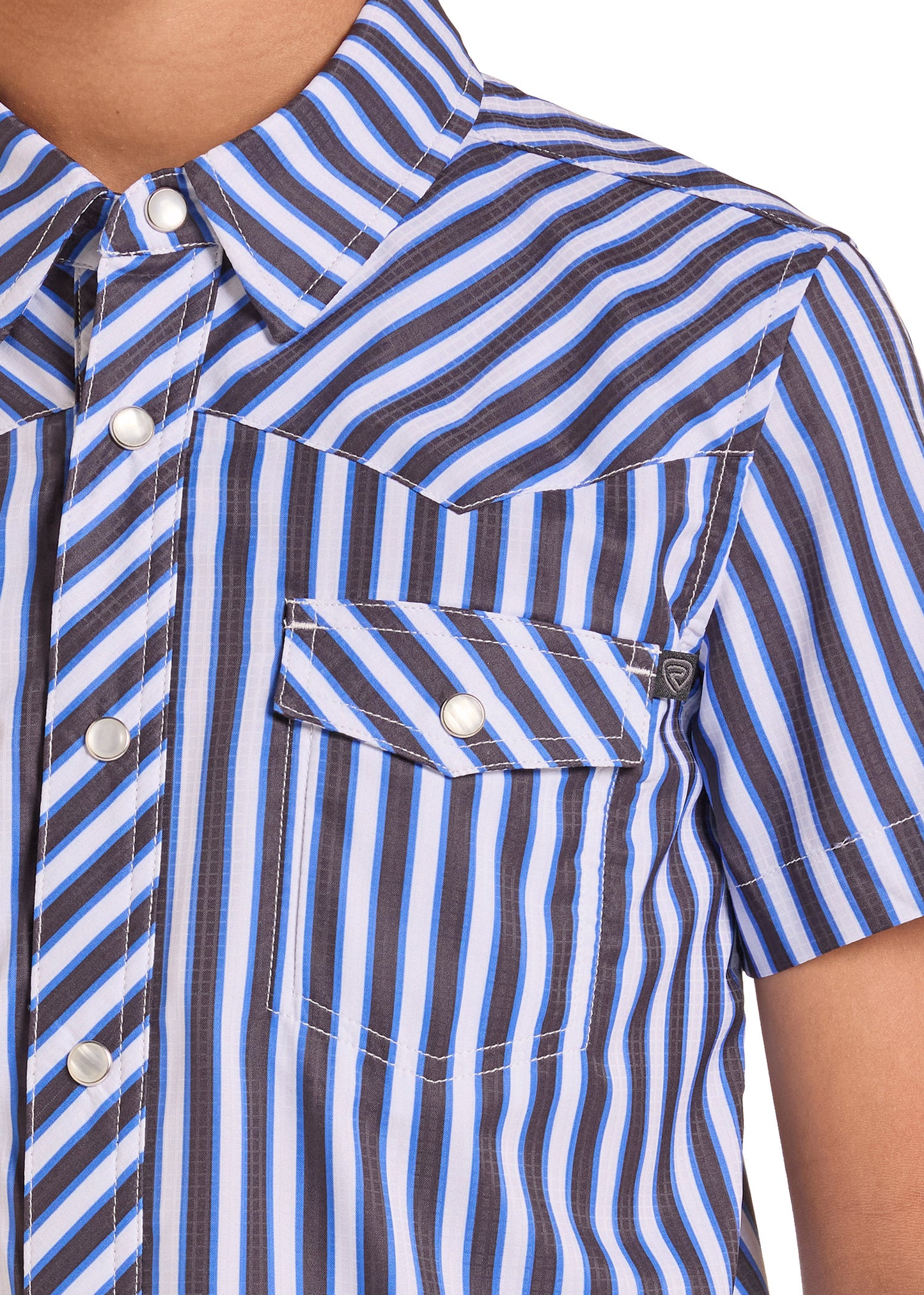 Close-up of a short-sleeve button-up shirt with diagonal blue, white, and dark brown stripes, featuring a chest pocket with white buttons.