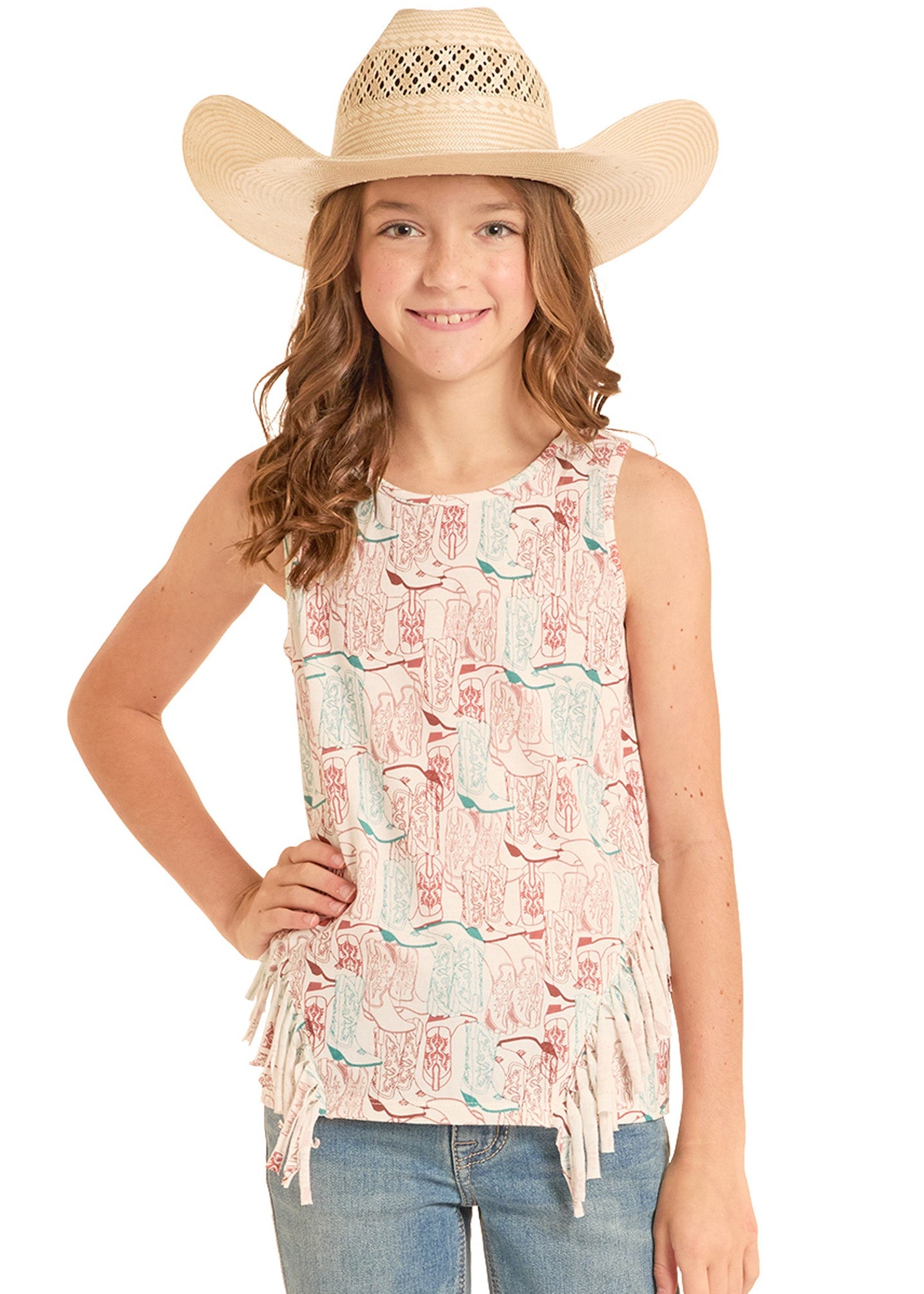 Young girl wearing a floral sleeveless top and cowboy hat on a white background