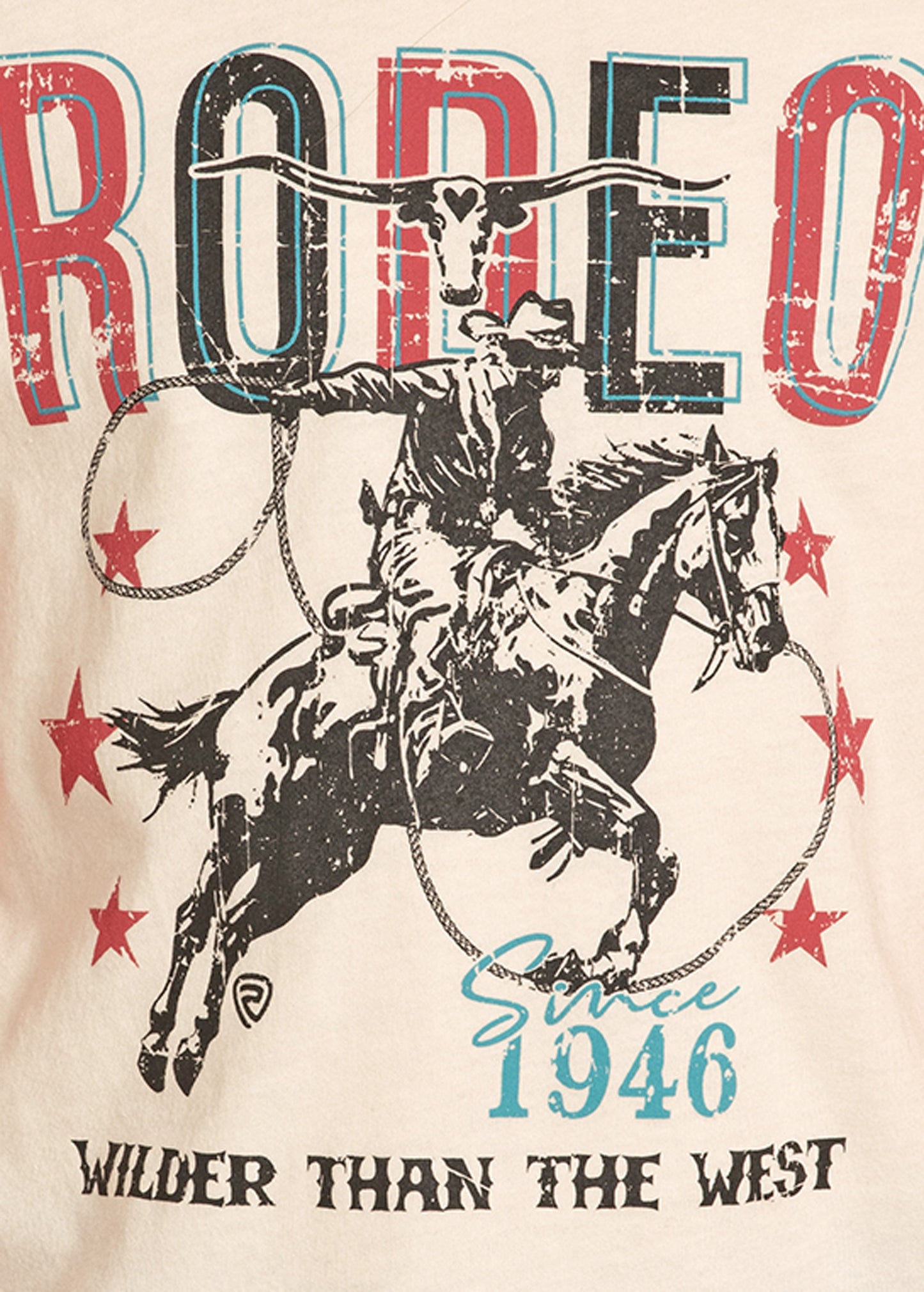 T-shirt design with a cowboy riding a horse, lasso, and text 'Rodeo Since 1946 Wilder Than The West' on a beige background.