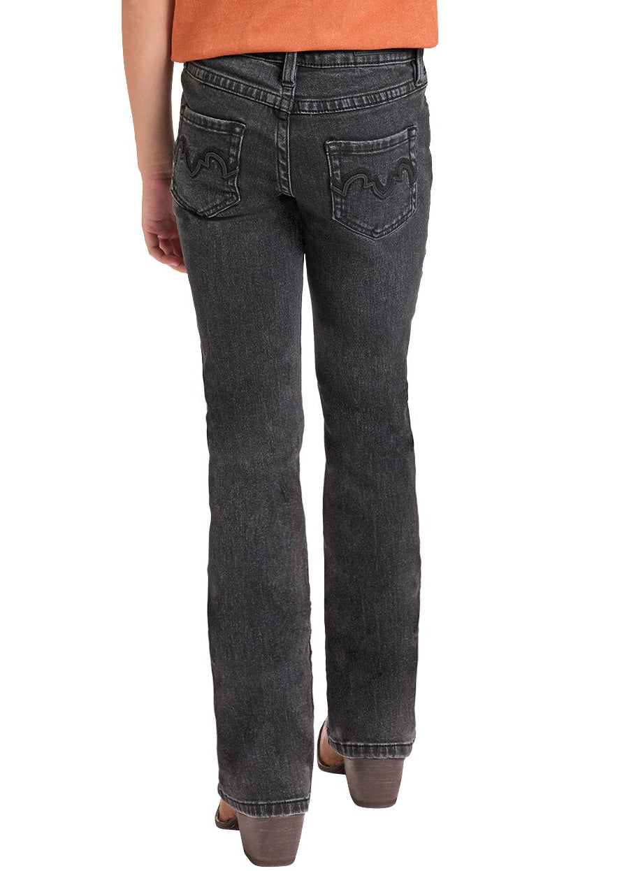 A child model shown from the back wearing a beige wide-brim cowboy hat, a burnt orange short-sleeve t-shirt, dark gray jeans, and brown boots, set against a plain white background.