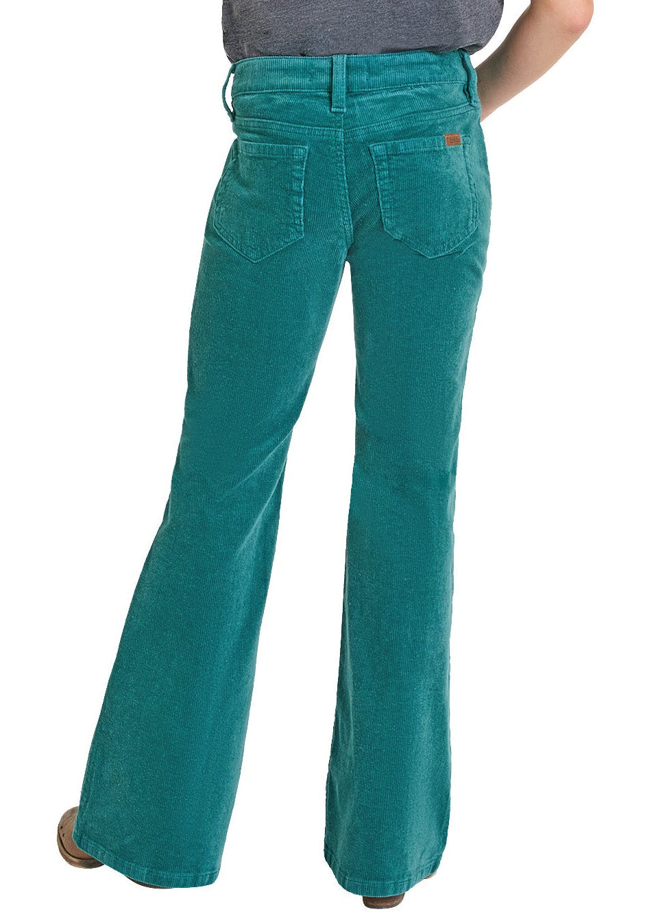 Person wearing teal flared jeans and a gray shirt with a white background
