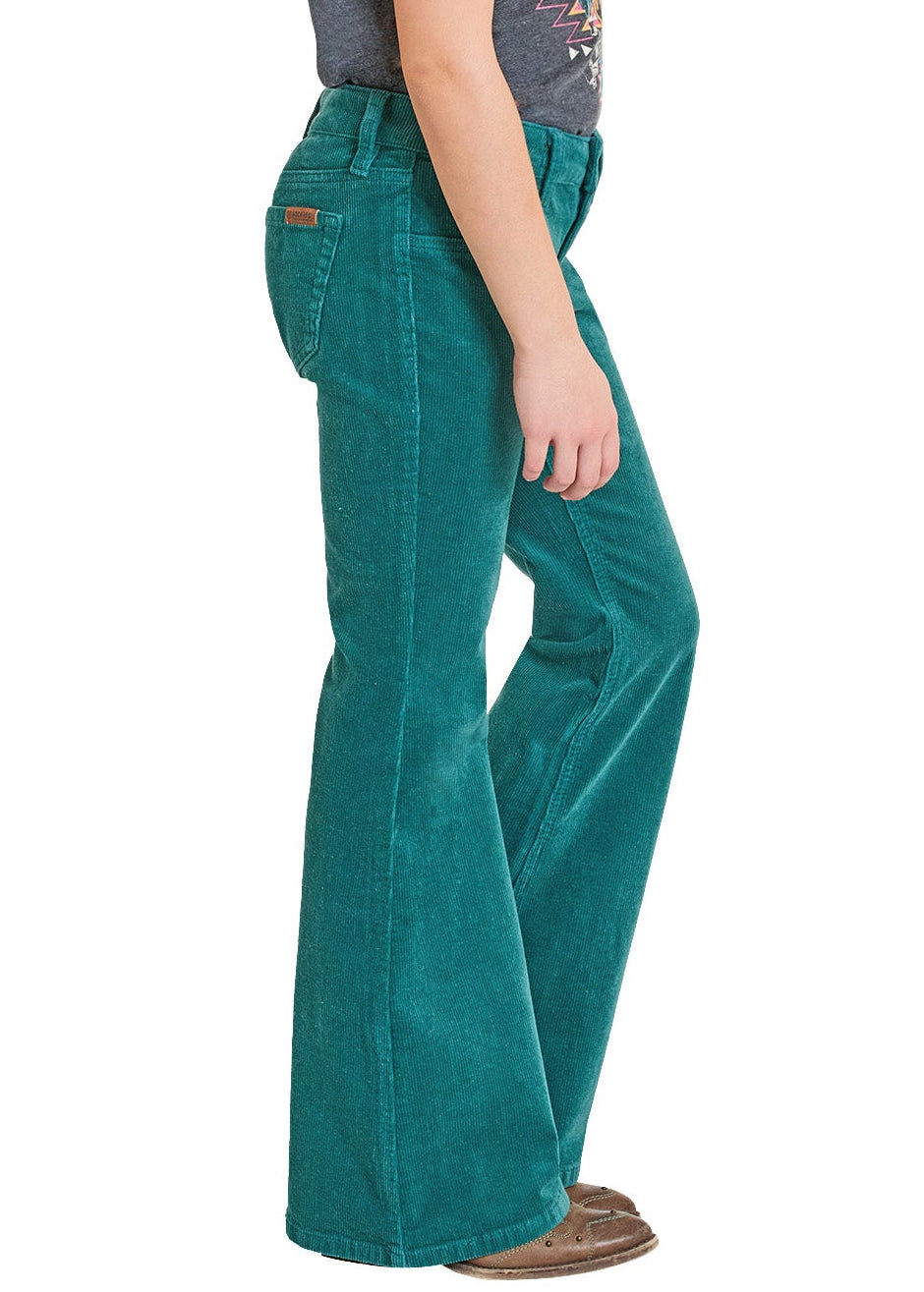 Person wearing teal flared jeans and a white cowboy hat on a white background