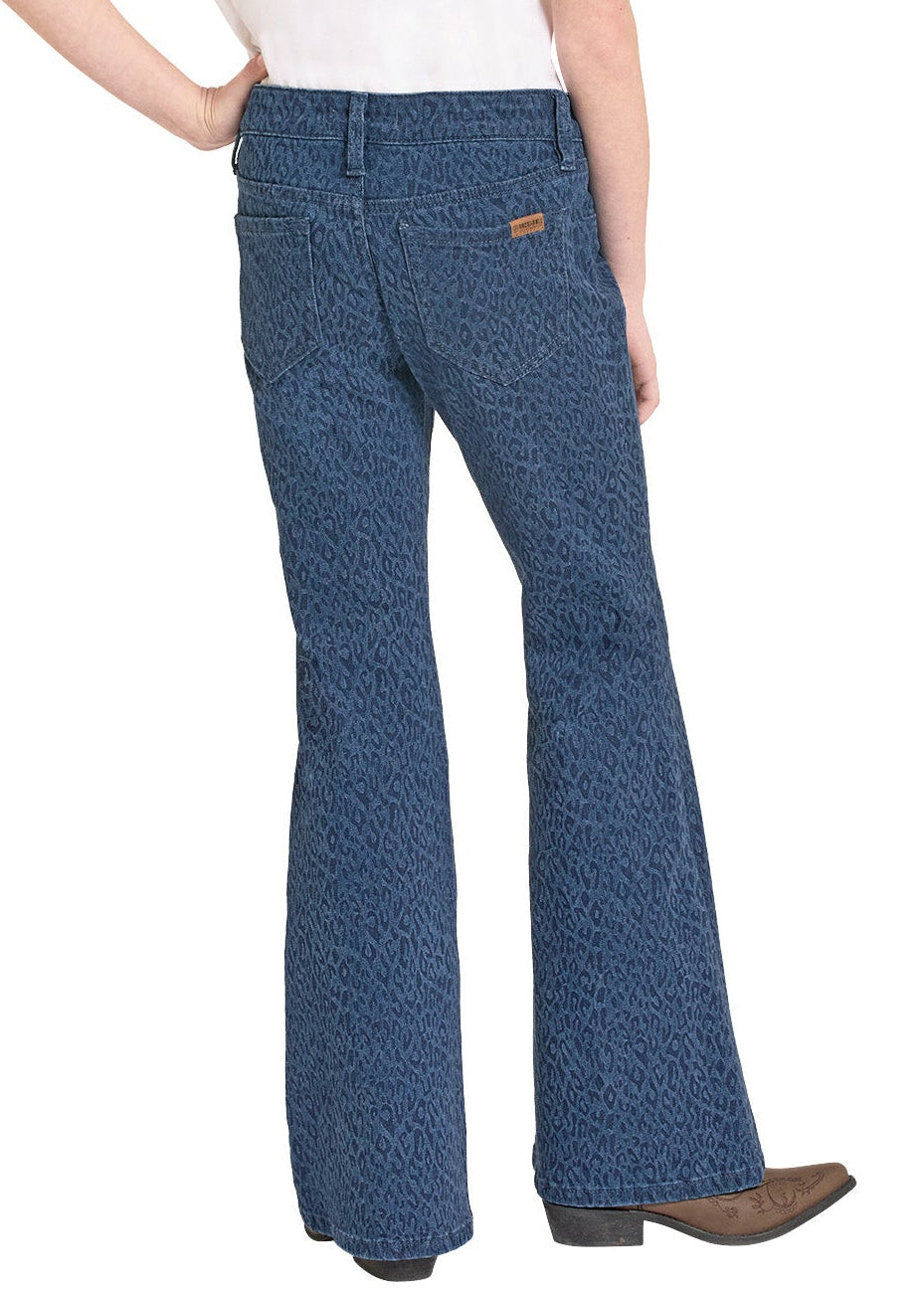 Girl wearing a white shirt, blue patterned Flare printed jeans on a white background