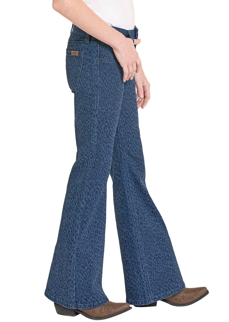 Girl wearing a white shirt, blue patterned Flare printed jeans on a white background