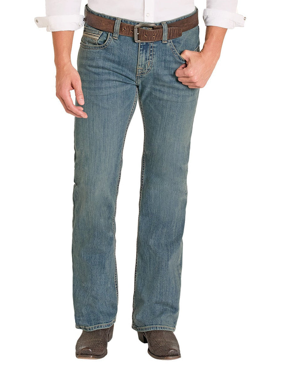 Man wearing a white shirt, blue jeans, and a brown cowboy hat on a white background