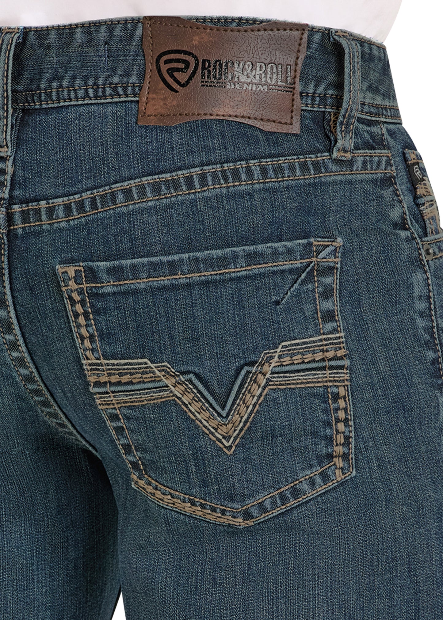 Close-up of blue jeans with a brand label on the back pocket.