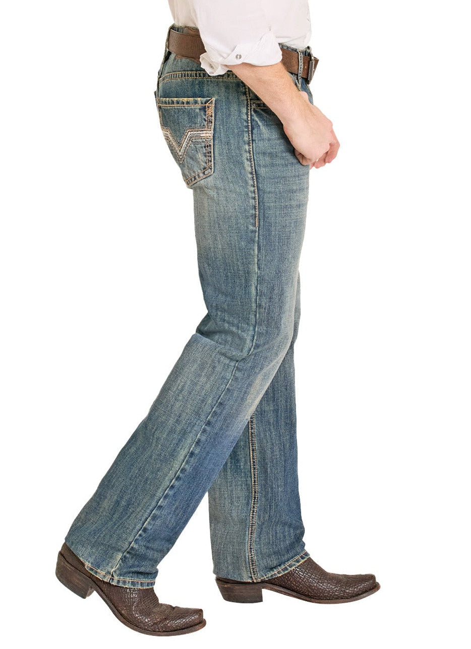 Man wearing a cowboy hat, white shirt, and blue jeans on a white background