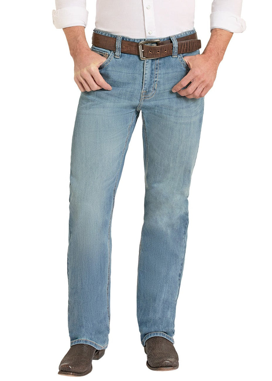 Man wearing a white shirt, blue jeans, and a cowboy hat on a white background