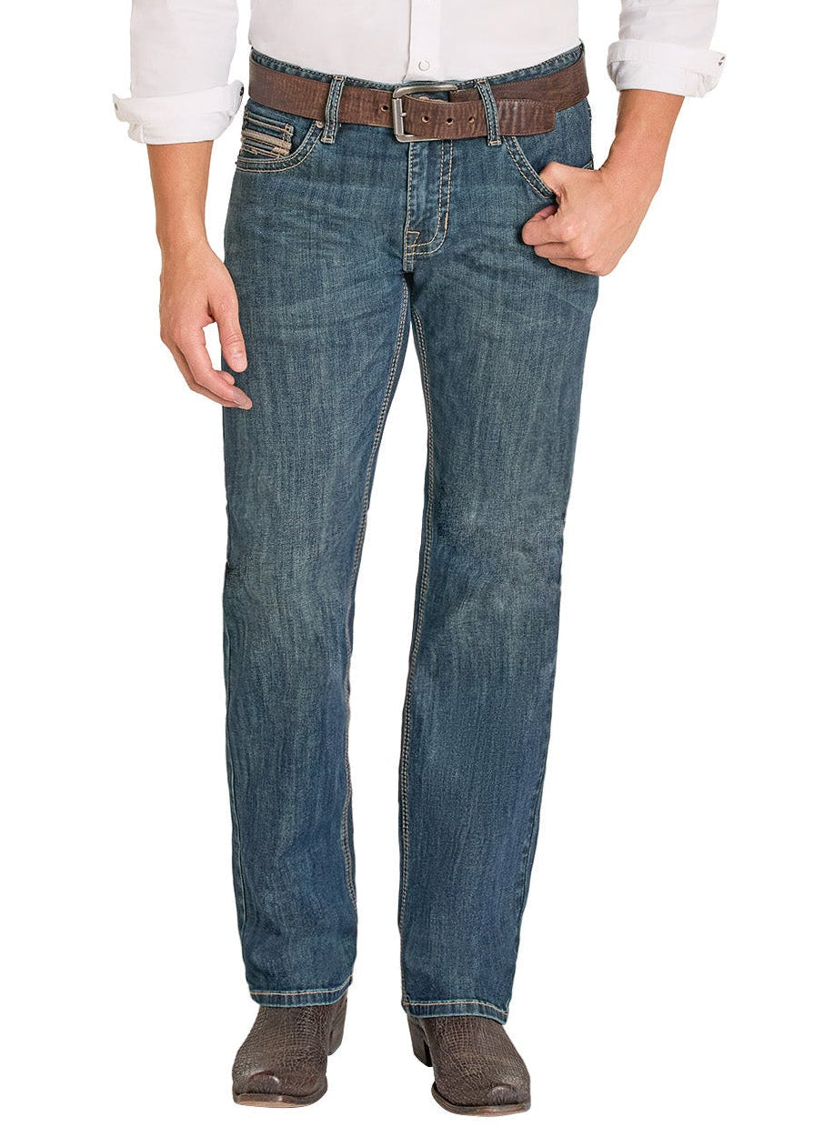 Person wearing blue jeans with a brown belt on a white background