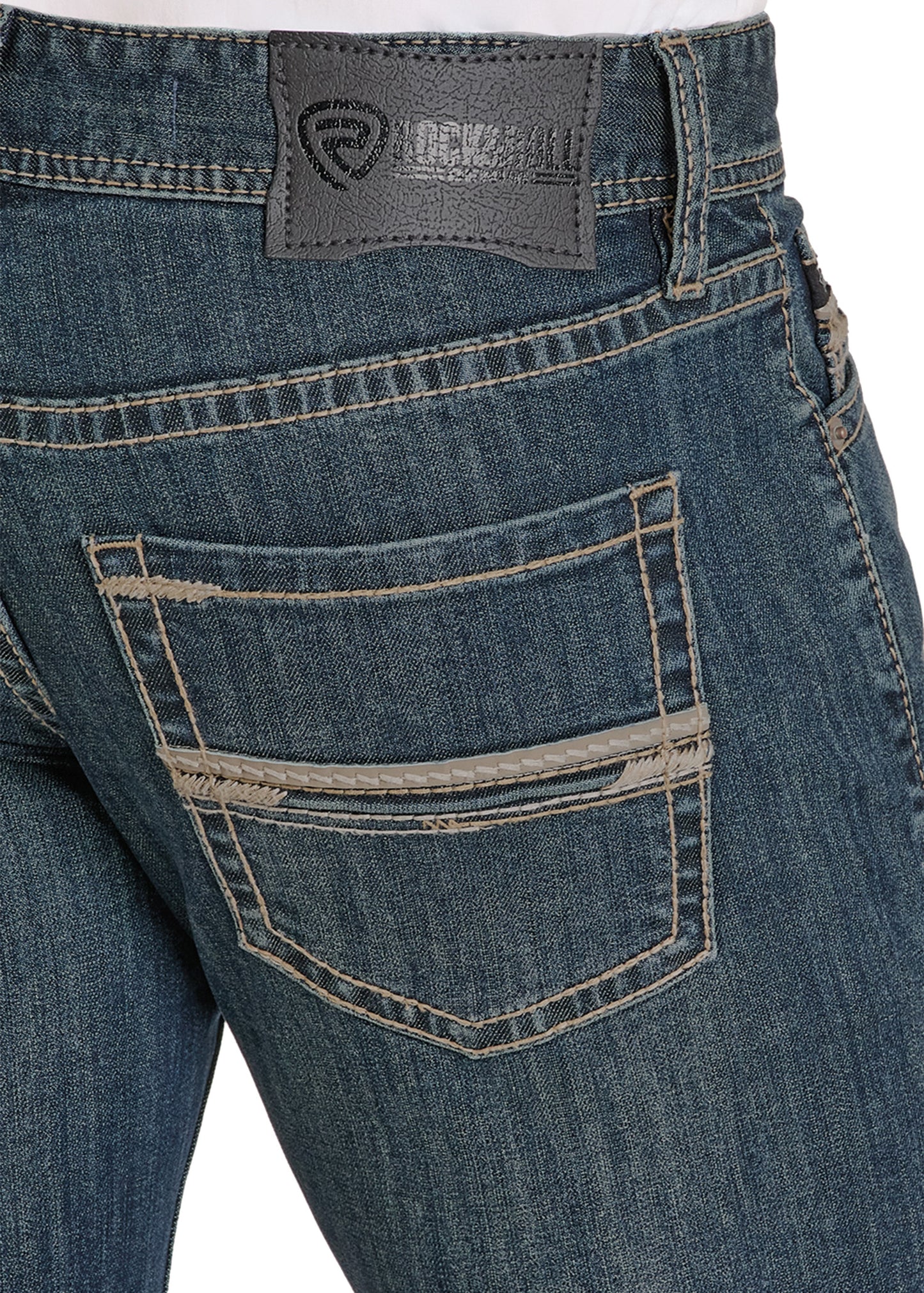 Close-up of blue jeans with a brand label on the back pocket.