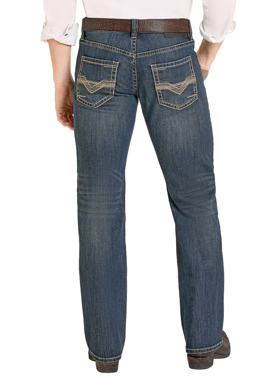 Man wearing a white shirt, blue jeans, and a beige cowboy hat on a white background