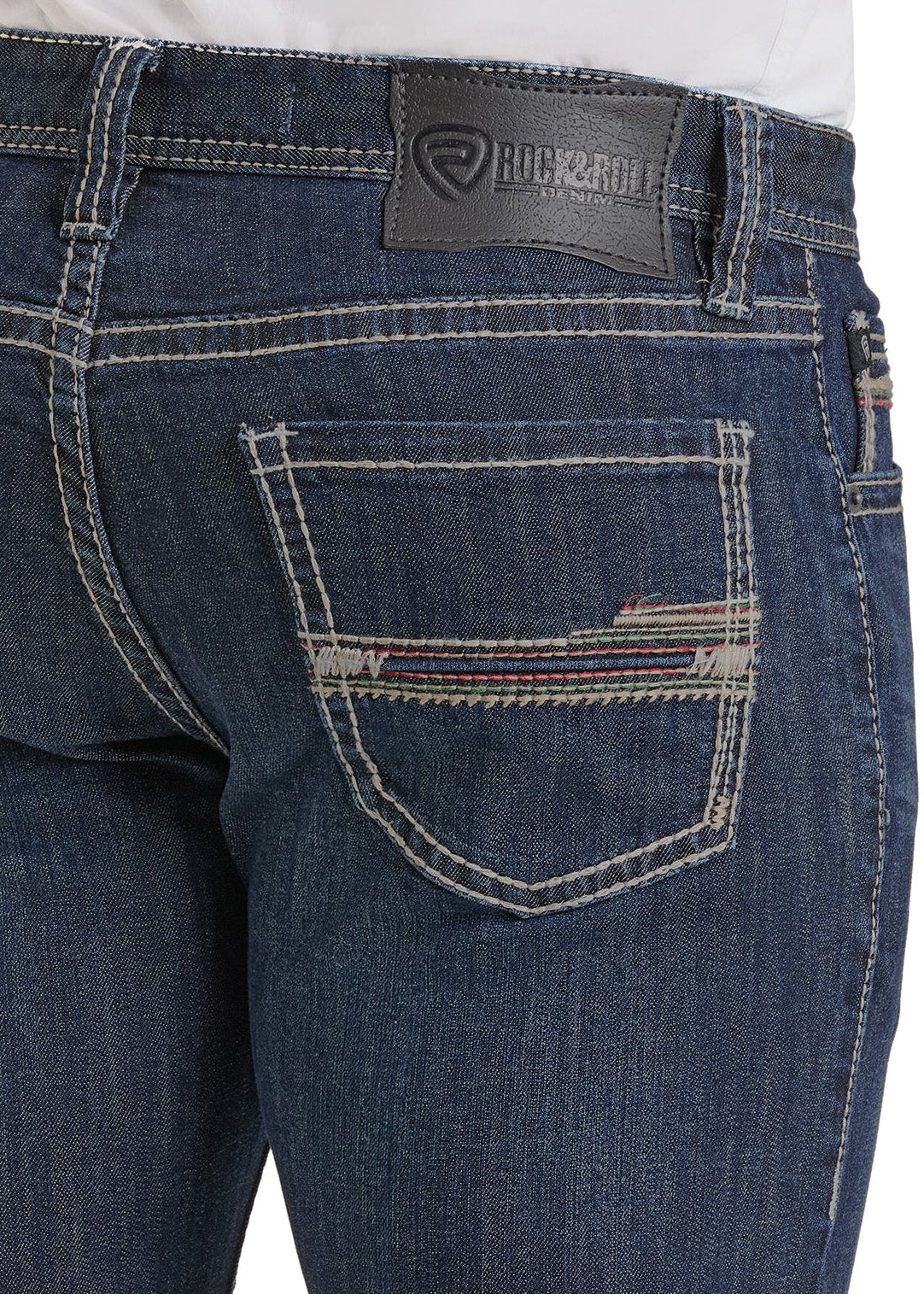 Close-up of blue jeans with a brand logo on the back pocket against a white background