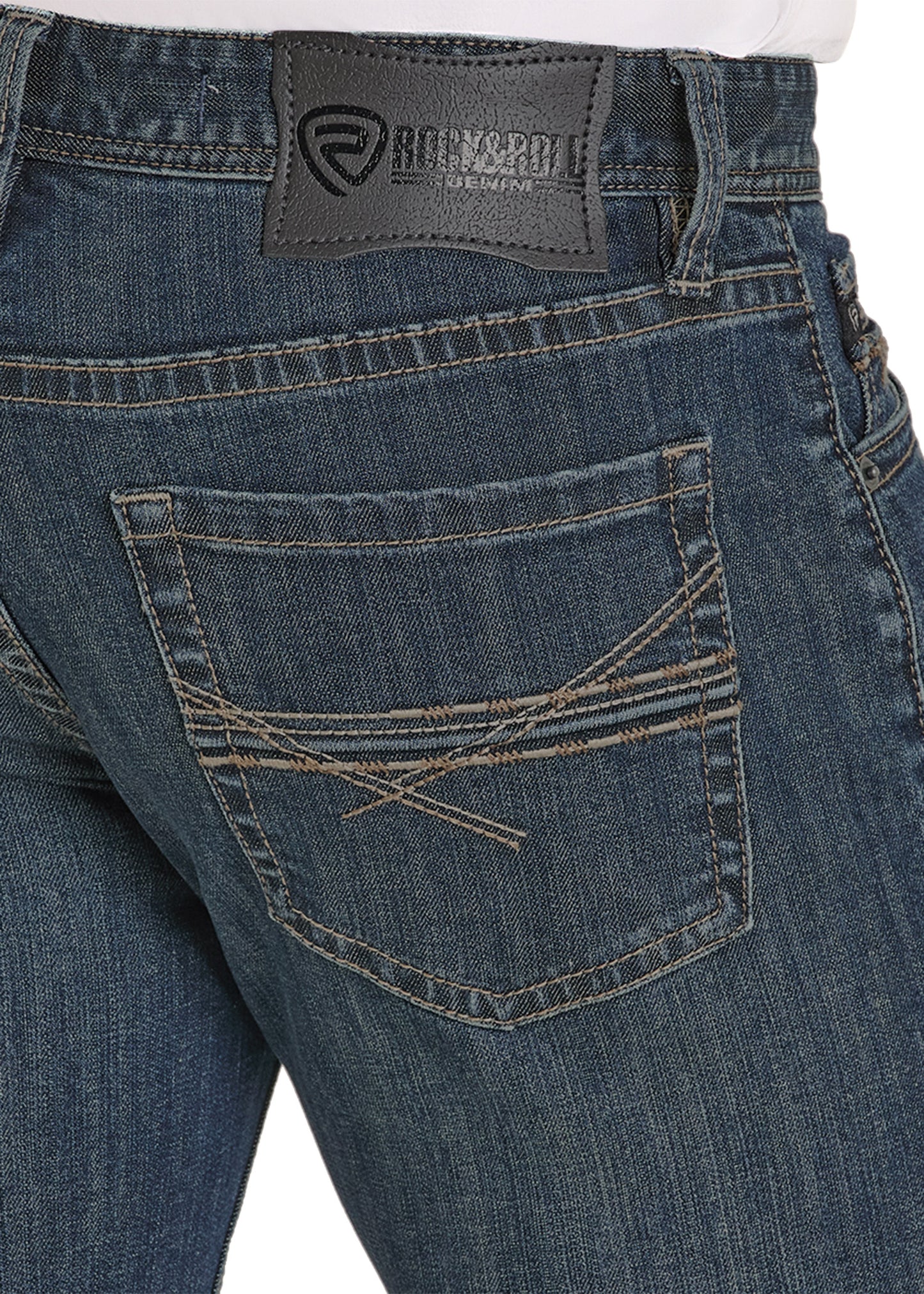 Close-up of blue jeans with a brand label on a white background