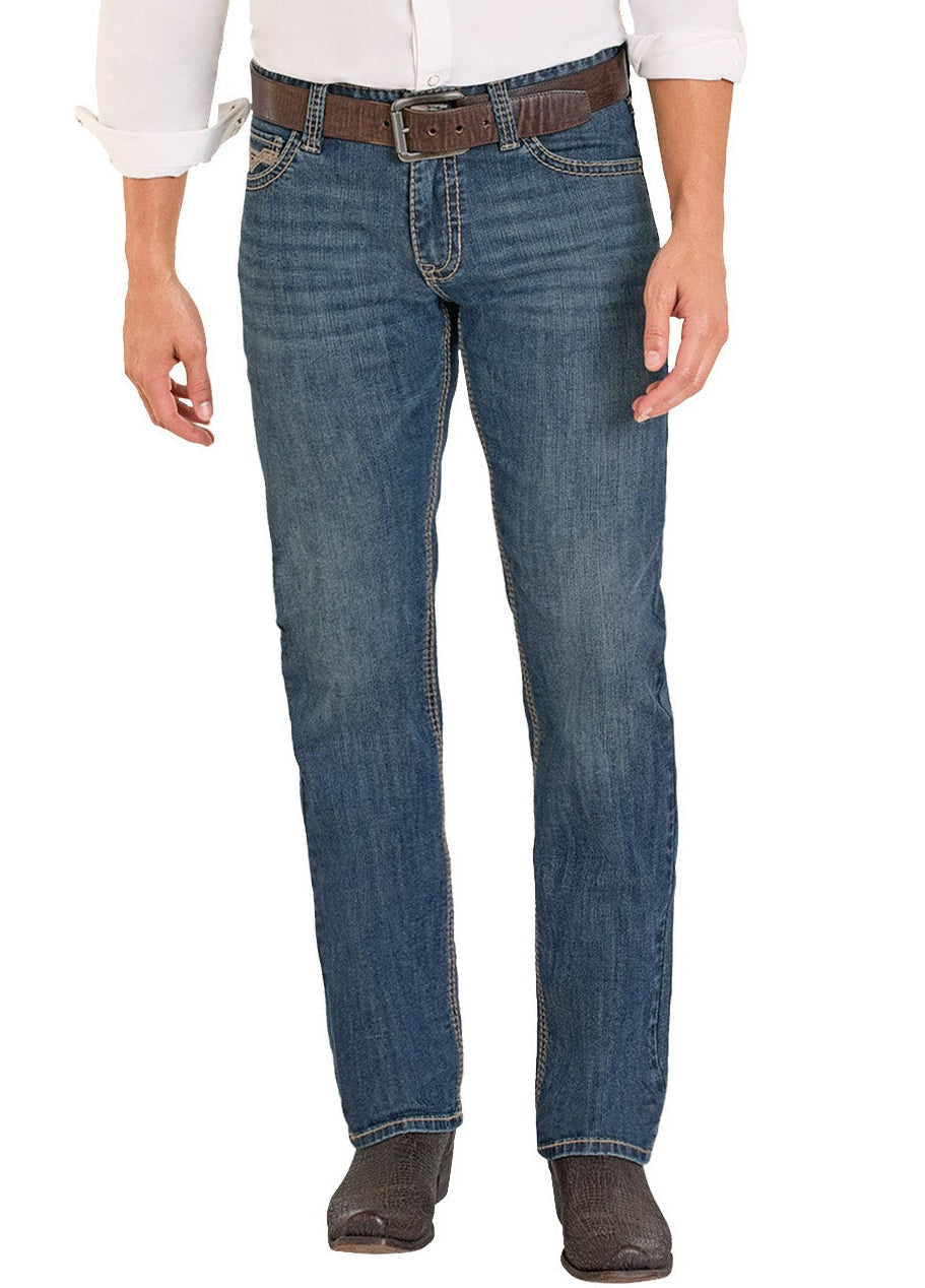 Person wearing blue jeans with a brown belt on a white background