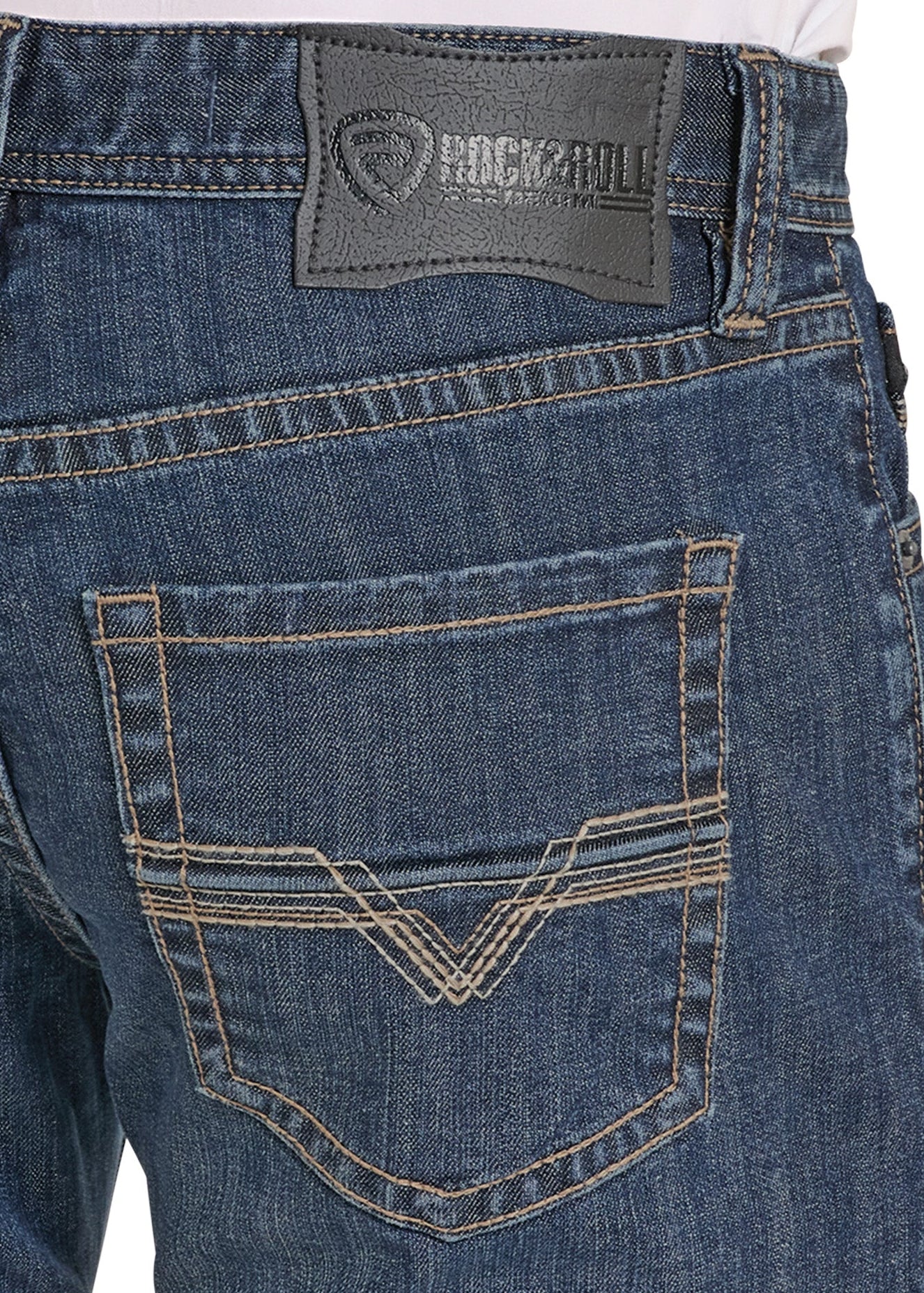 Close-up of blue jeans with a brand logo on the back pocket against a white background