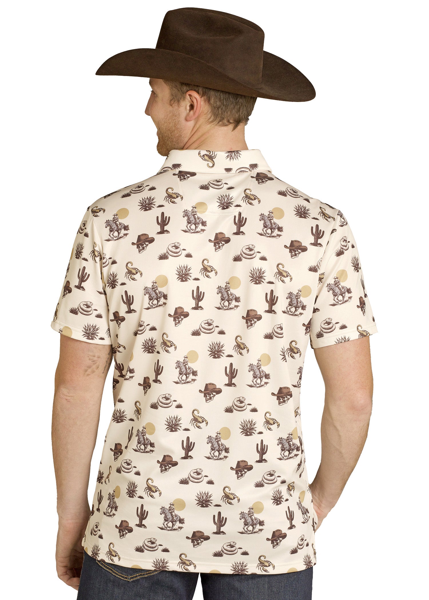 Man wearing a patterned shirt with cowboy-themed designs on a white background
