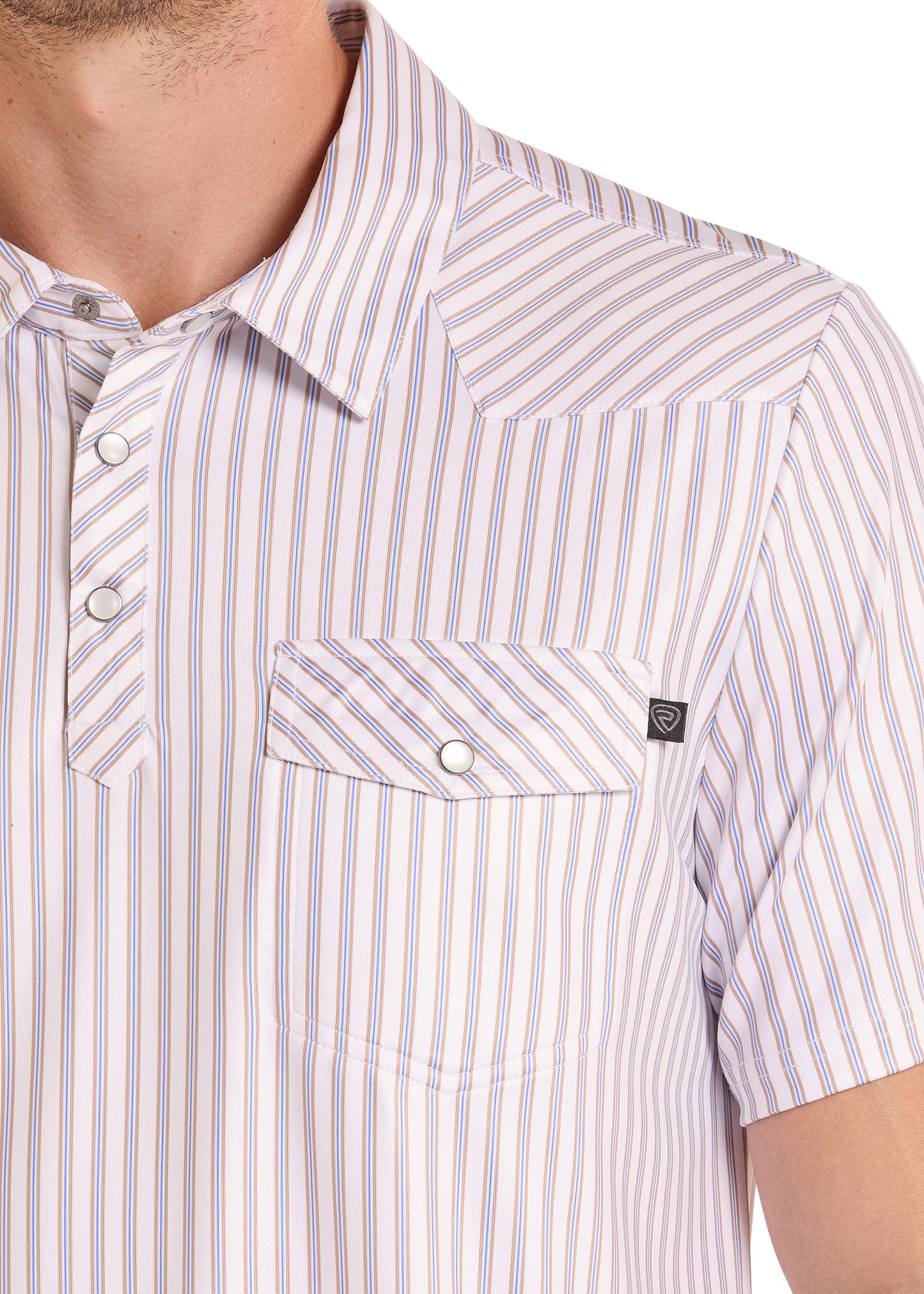 Close-up of a striped shirt with a pocket and button details.