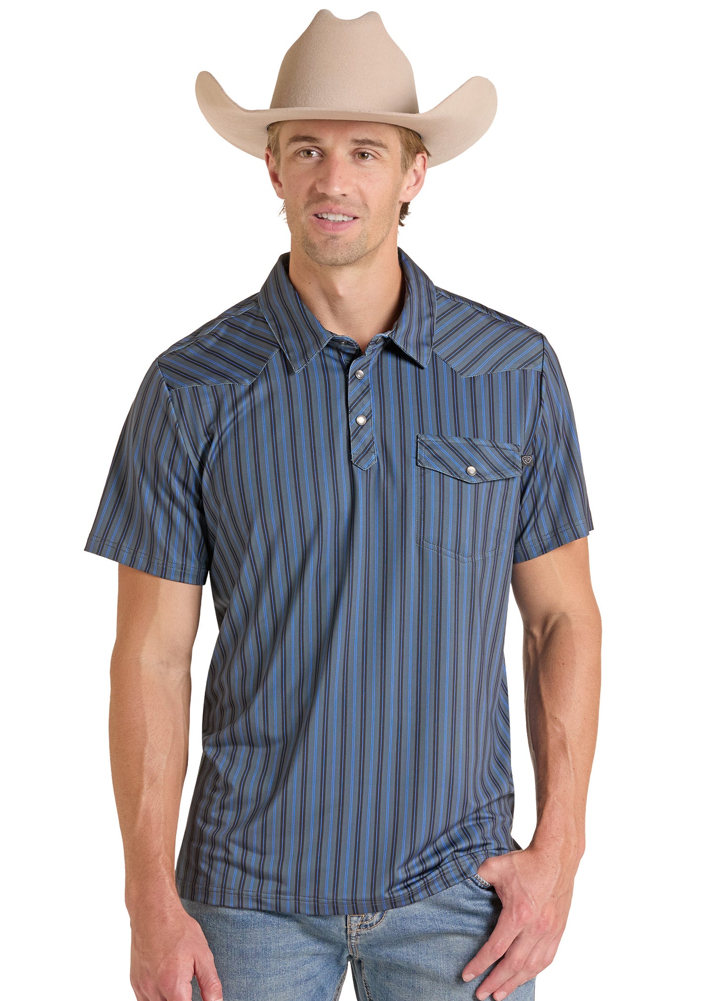 A man wearing a blue and gray vertically striped short-sleeve western shirt, a beige cowboy hat, and blue jeans, photographed against a plain white background.