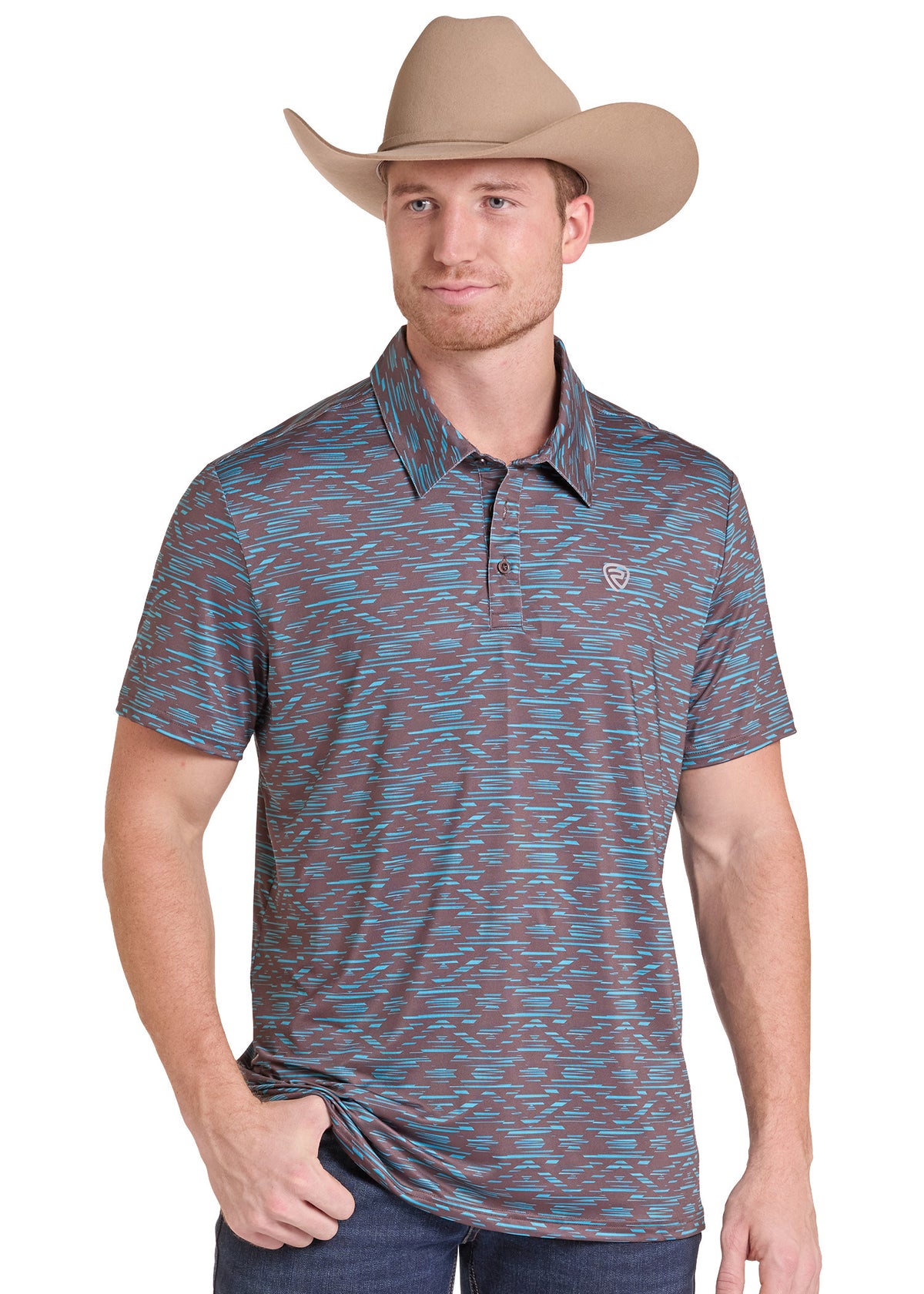 A man wearing a short-sleeve patterned polo shirt and a tan cowboy hat, standing against a plain white background.