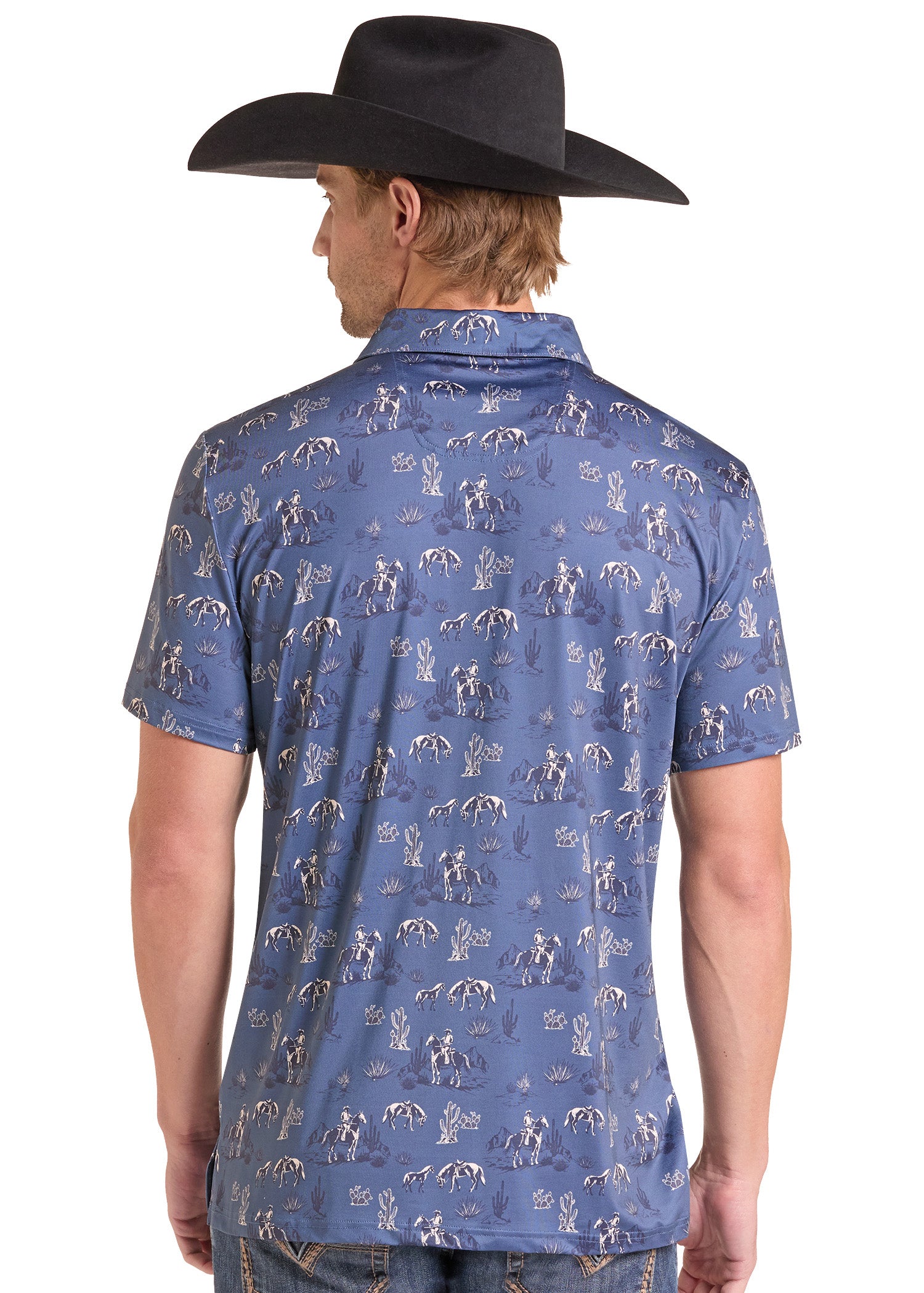 A man wearing a blue short-sleeve button-up shirt with a white cowboy-themed print, shown from the back. He is also wearing a black cowboy hat and blue jeans, photographed against a solid white background.