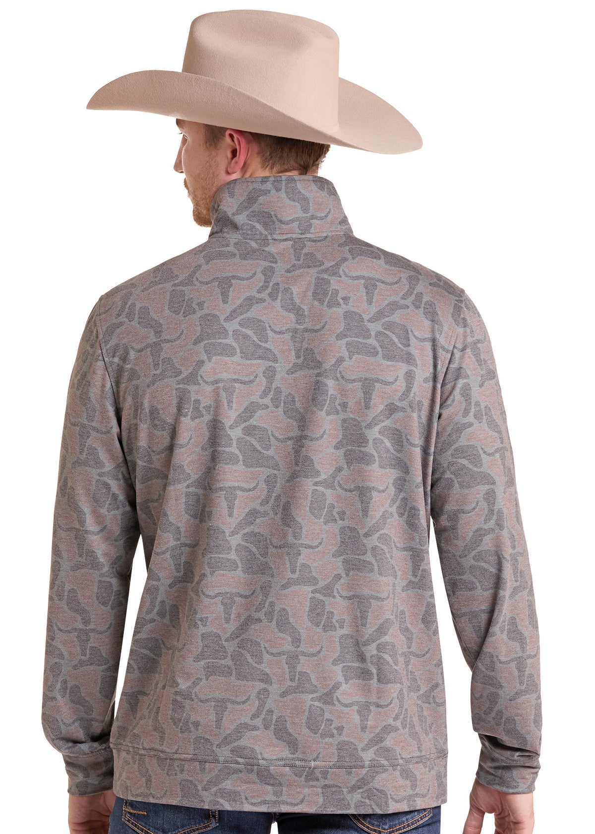 A man shown from the back wearing a beige cowboy hat and a gray and dusty rose camouflage print quarter-zip pullover jacket, paired with blue jeans, against a plain white background.