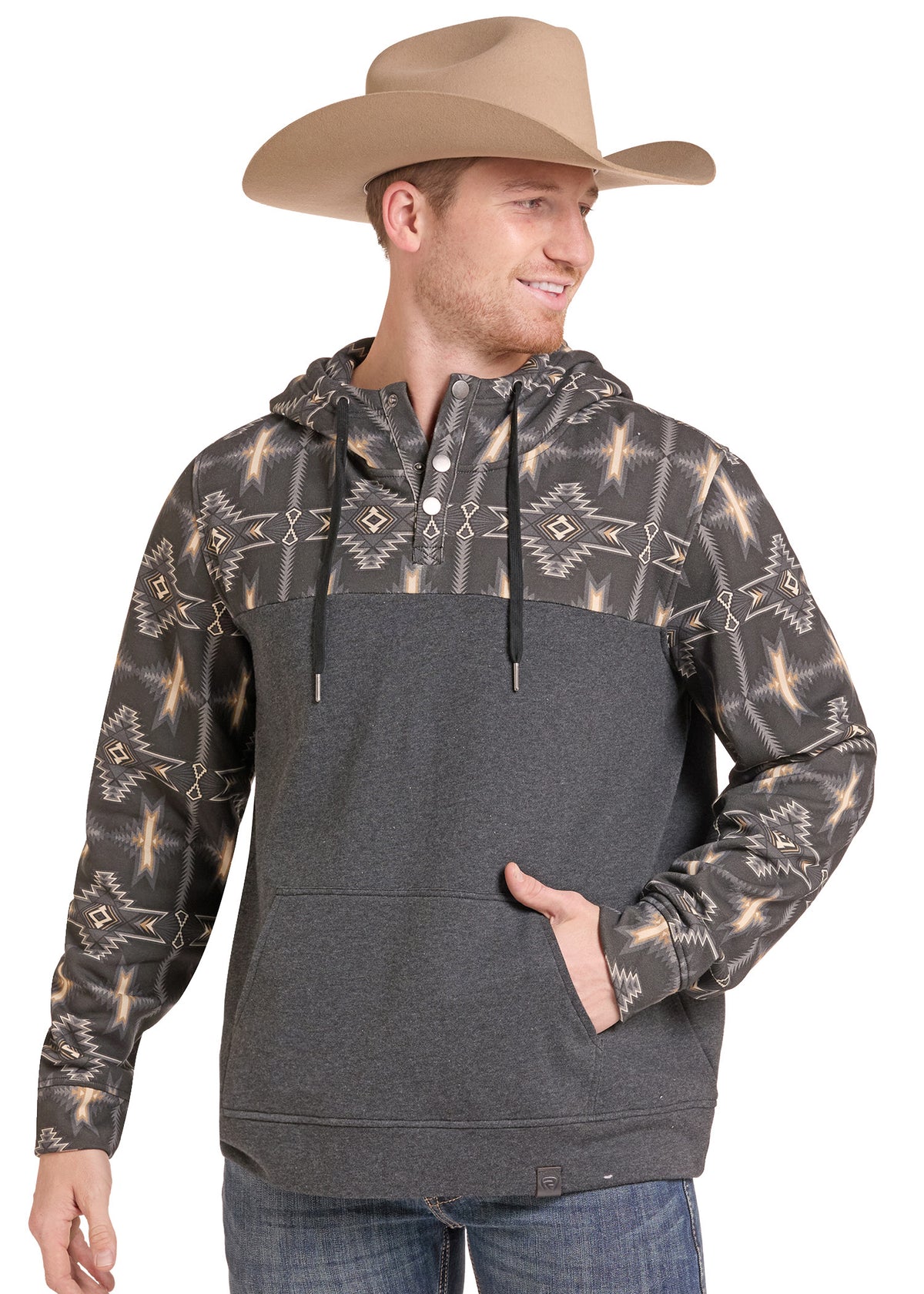 Man wearing a quarter snap hoodie with a cowboy hat and jeans