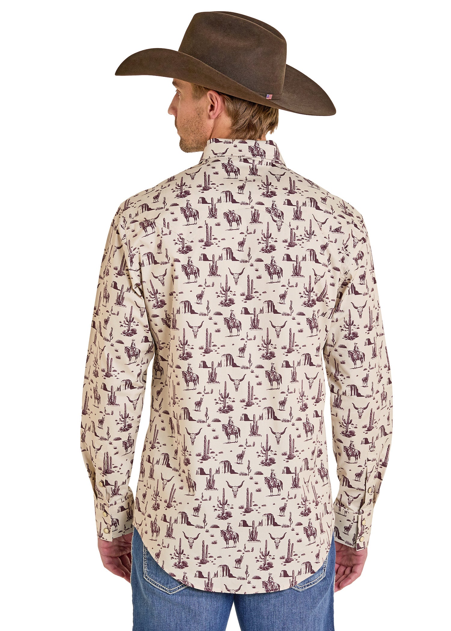 Man wearing a patterned shirt and cowboy hat on a white background
