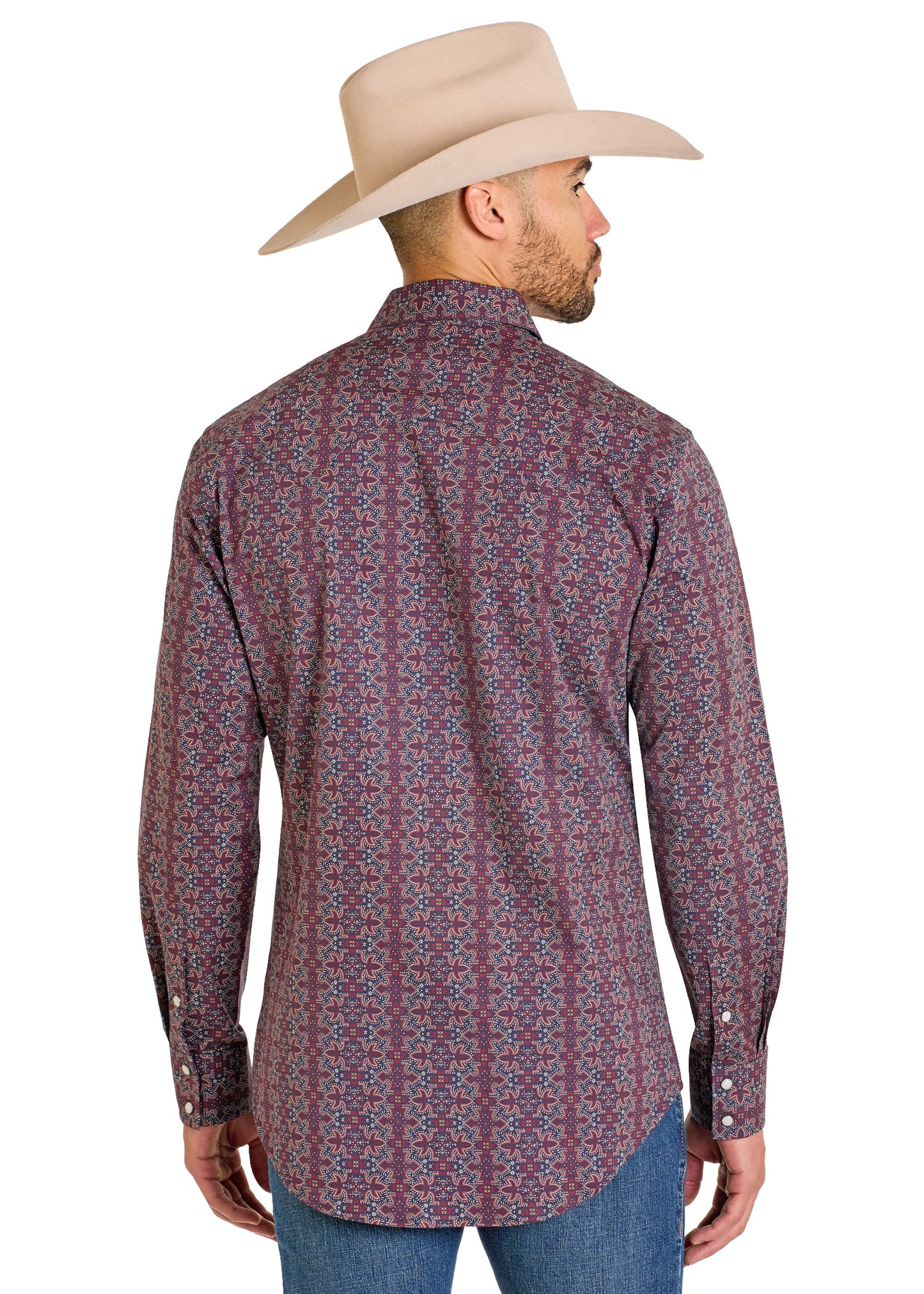 Man wearing a patterned shirt and cowboy hat on a white background