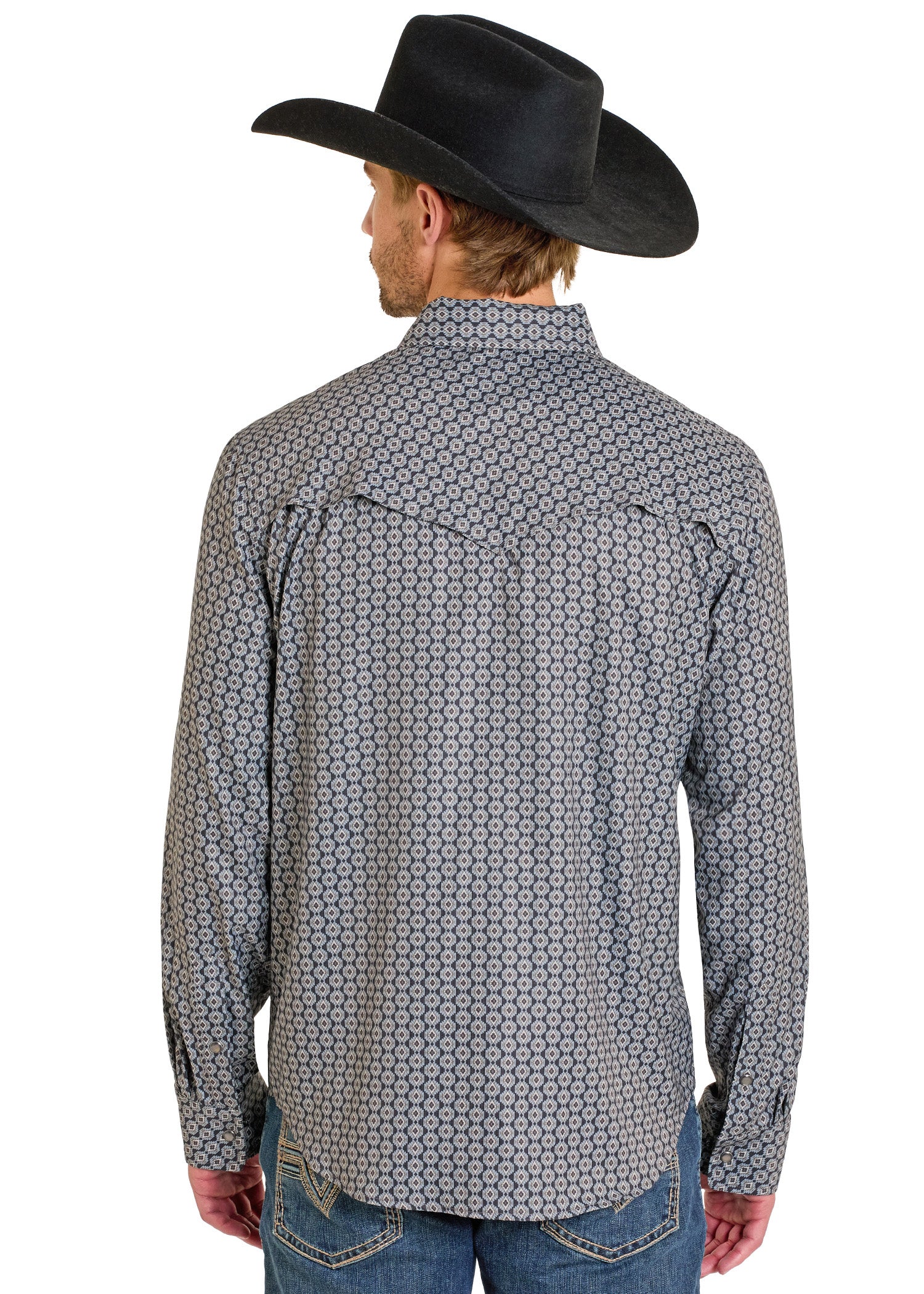 Man wearing a patterned long-sleeve shirt and black cowboy hat on a white background