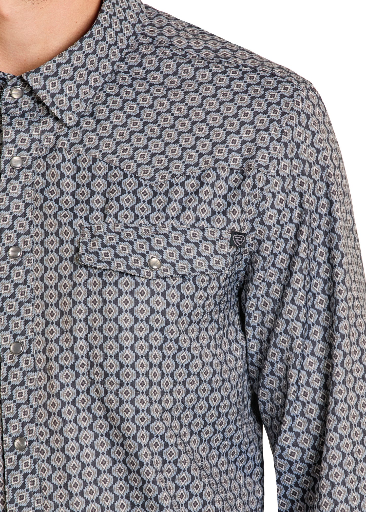 Close-up of a patterned shirt with a geometric design on a white background
