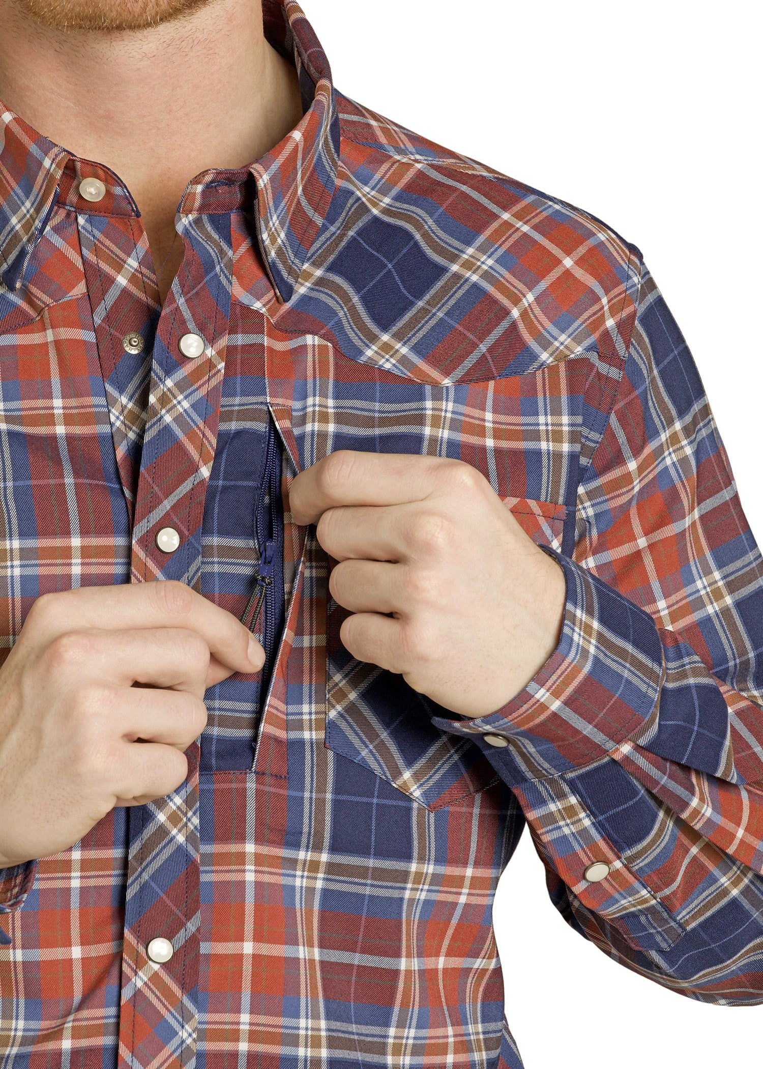 Close-up of a person wearing a red and blue plaid shirt, buttoning it up.