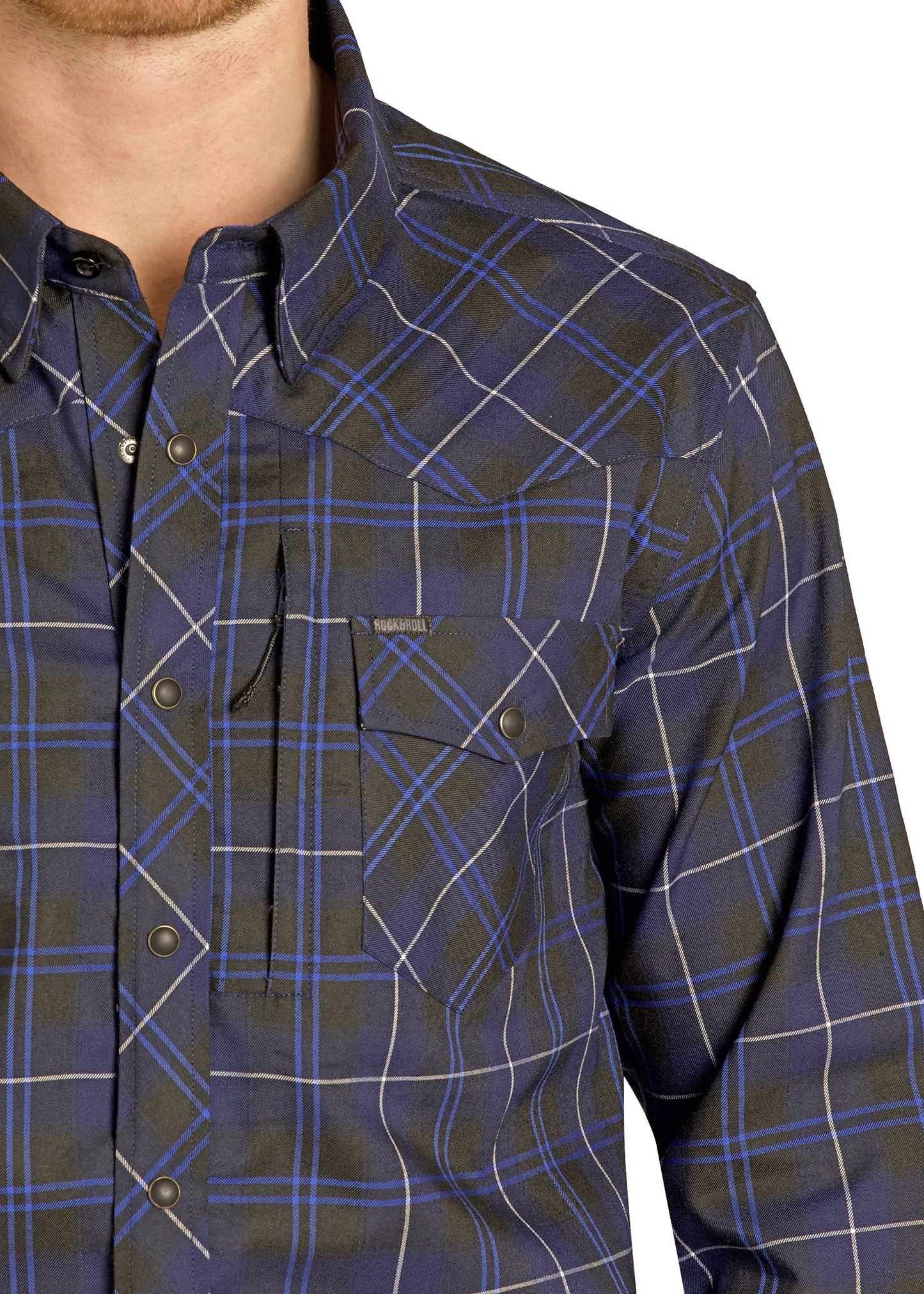 Close-up of a person wearing a blue and black plaid shirt with a visible brand logo.