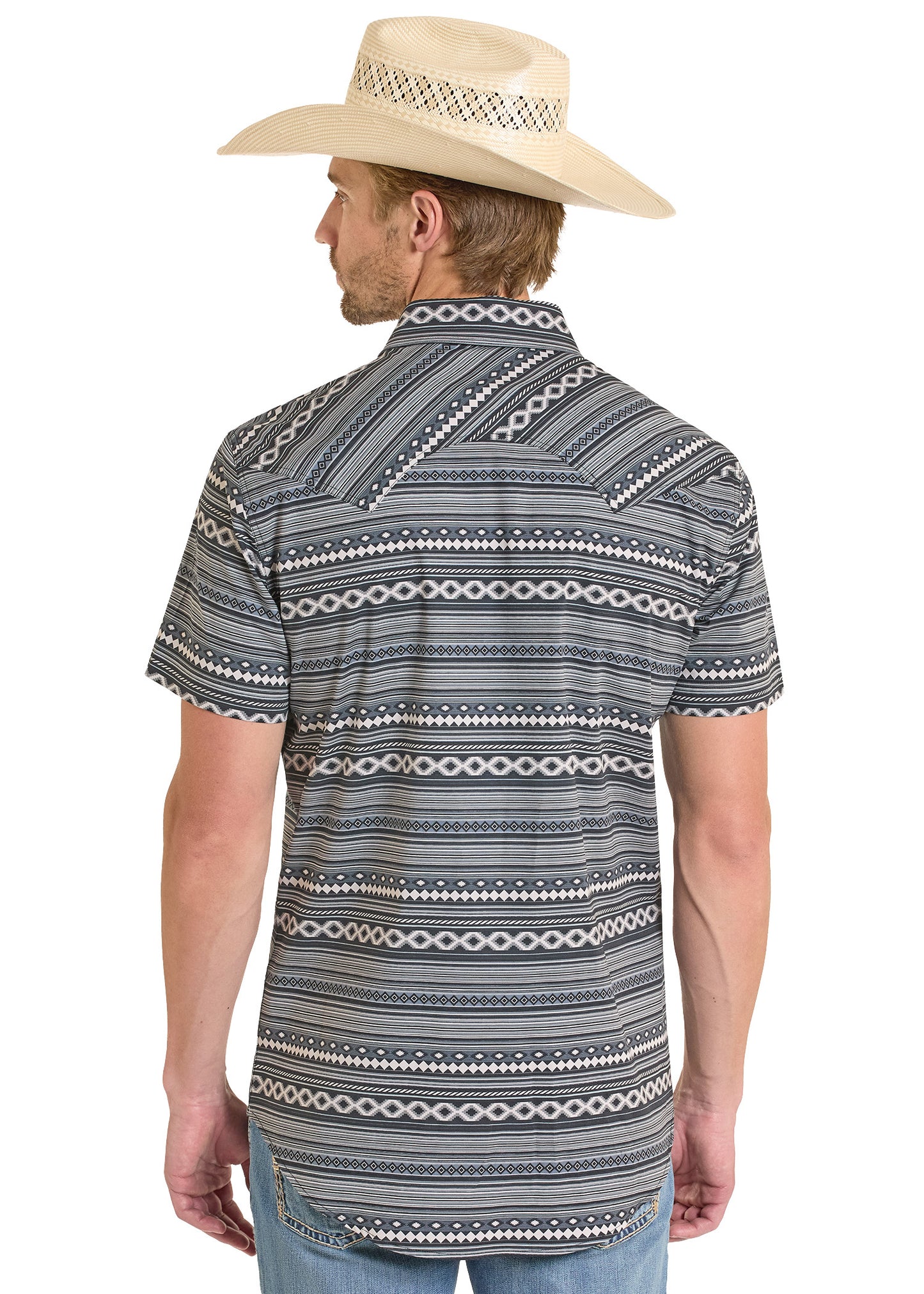 Man wearing a patterned short-sleeve shirt and cowboy hat on a white background
