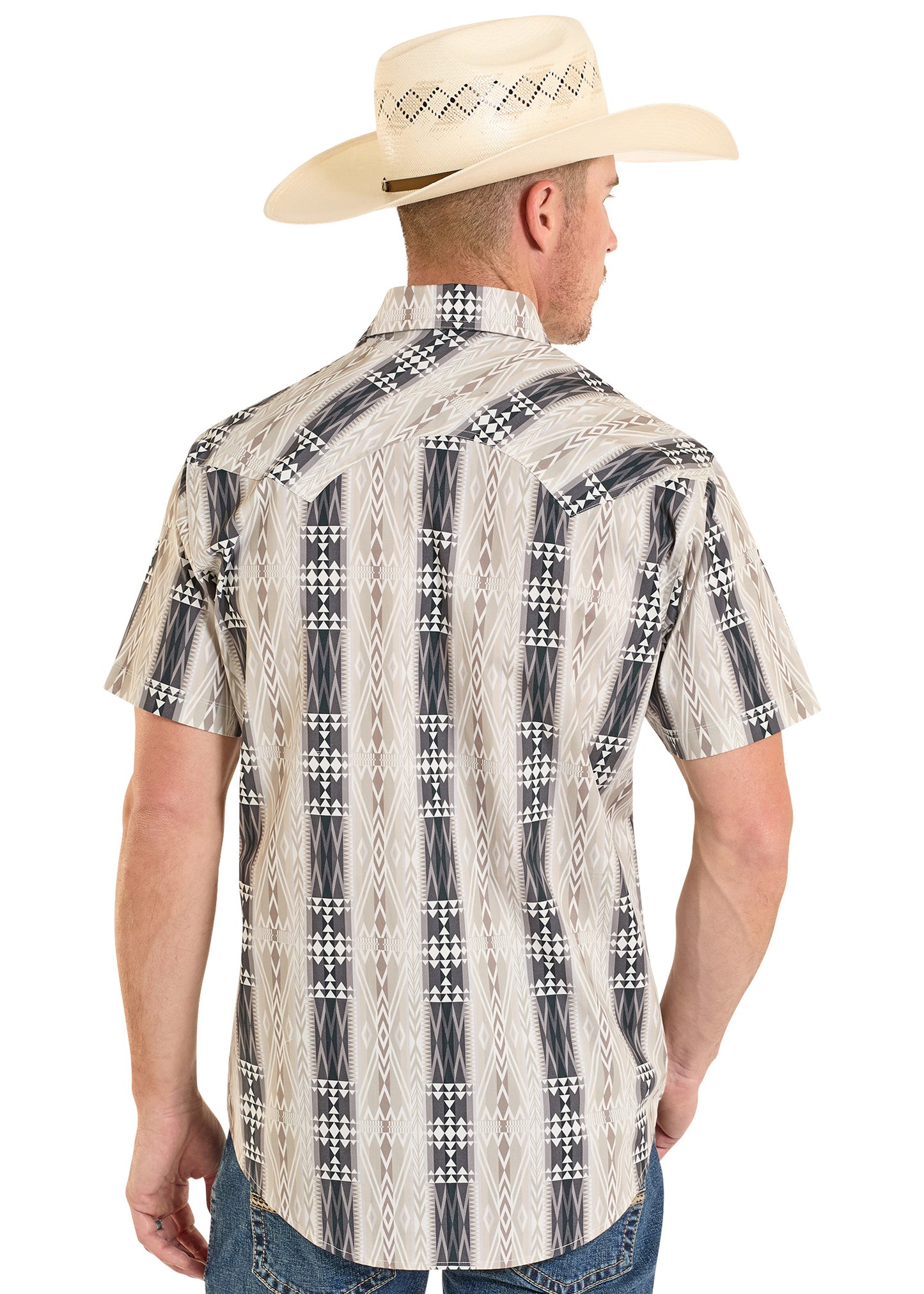 Man wearing a patterned short-sleeve shirt and cowboy hat on a white background