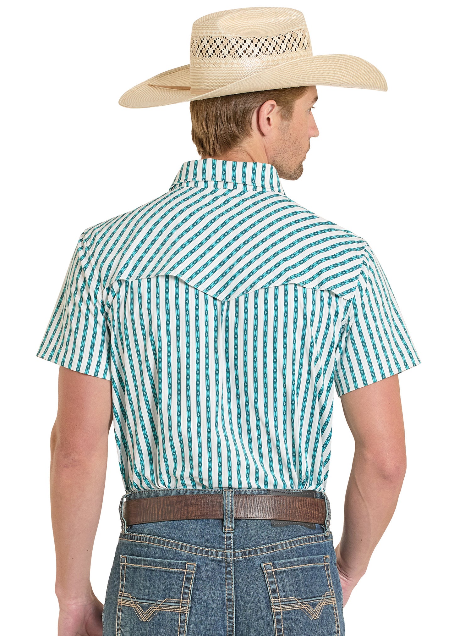Man wearing a green and white checkered shirt, blue jeans, and a straw cowboy hat on a white background