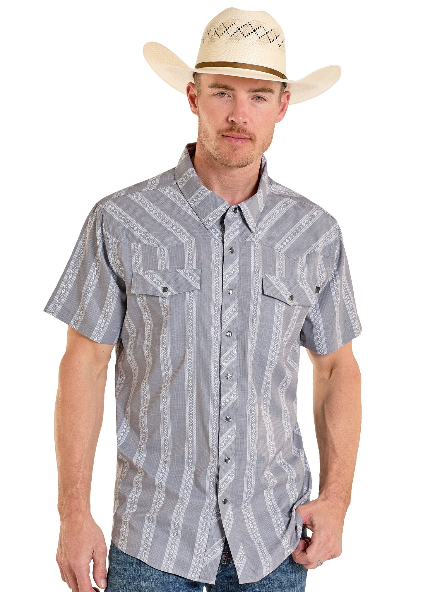 Man wearing a patterned short-sleeve shirt and cowboy hat on a white background